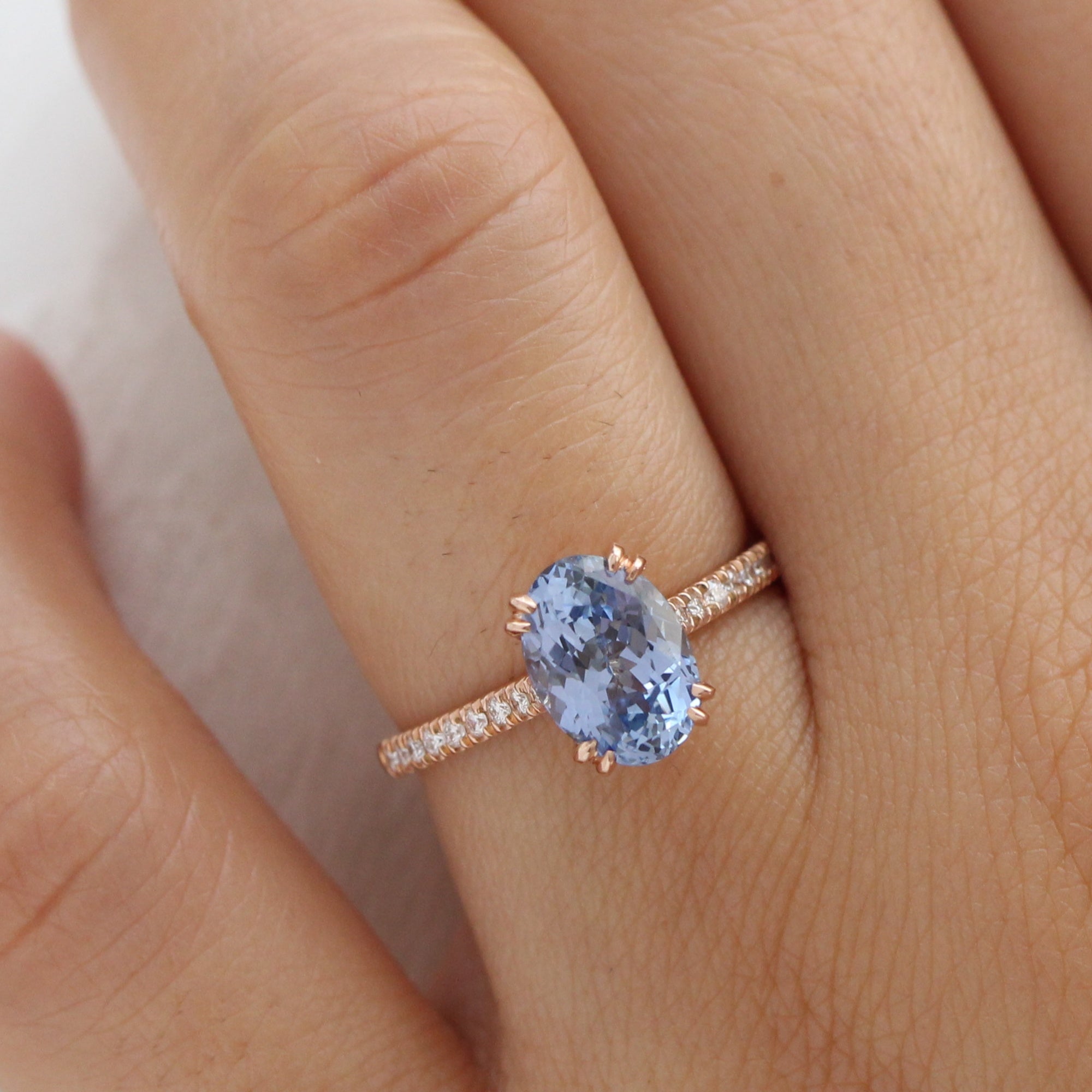 Rose gold ring with store blue sapphire