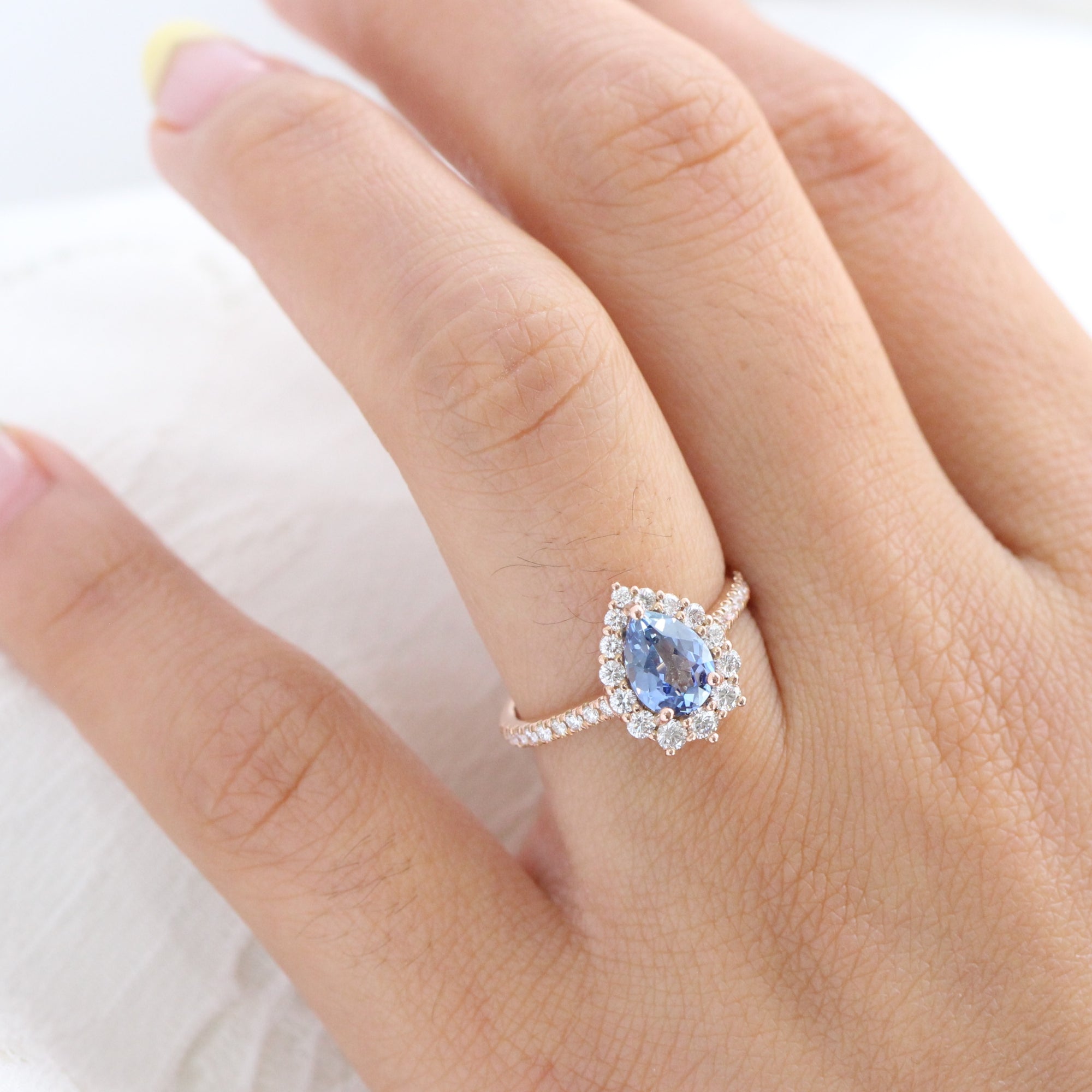 Pale blue deals engagement rings