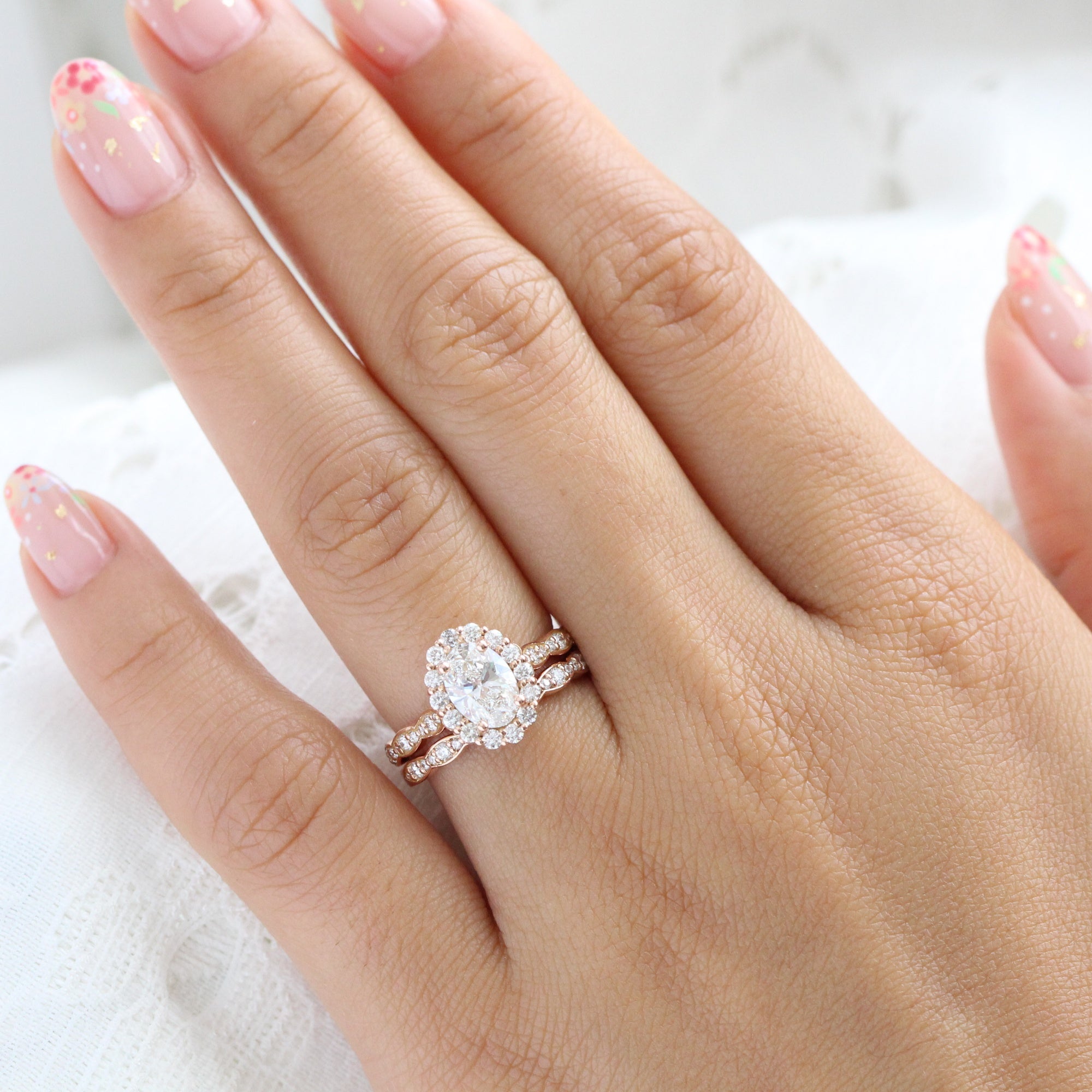 Oval engagement ring with shop wedding band