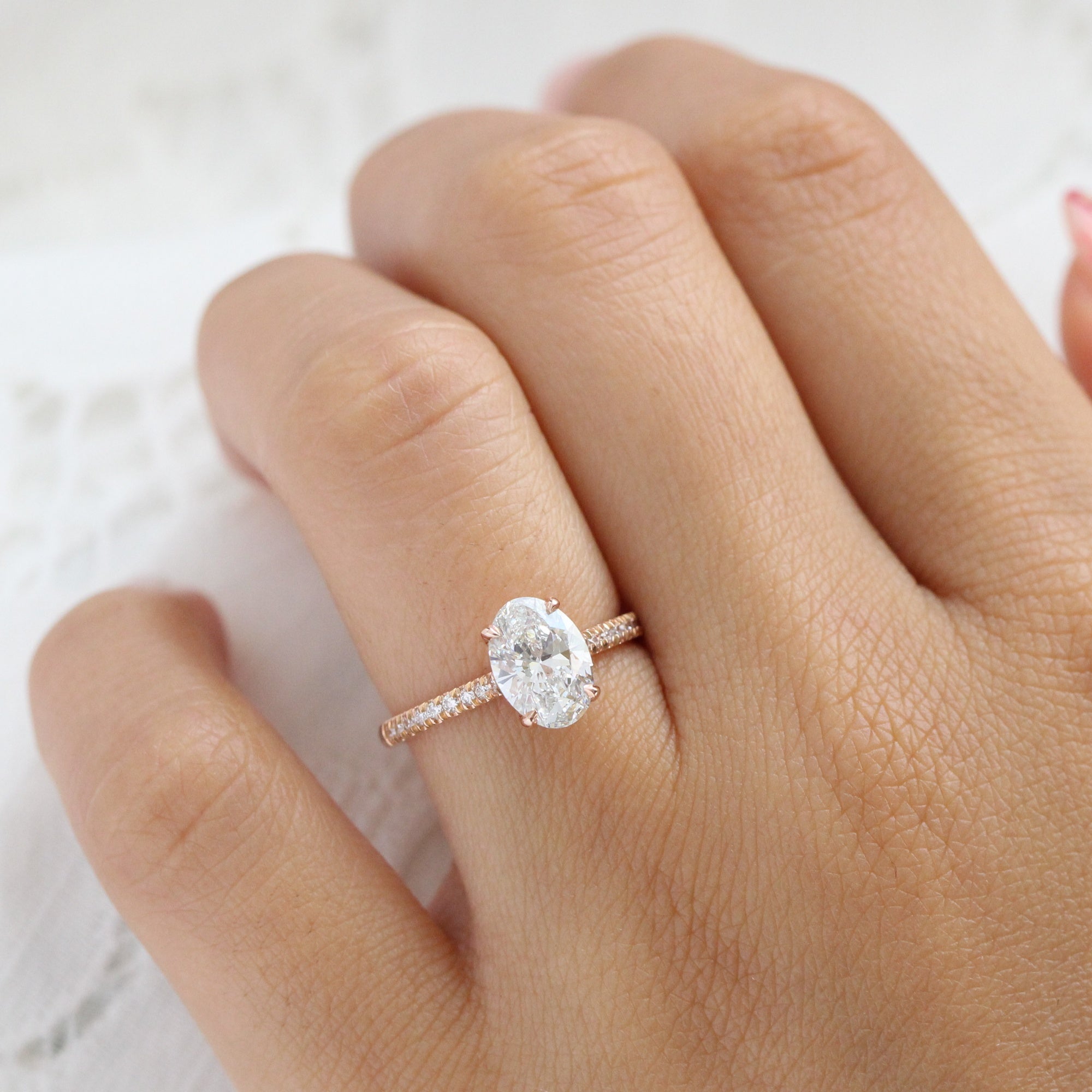 Oval cut engagement rings store thin band