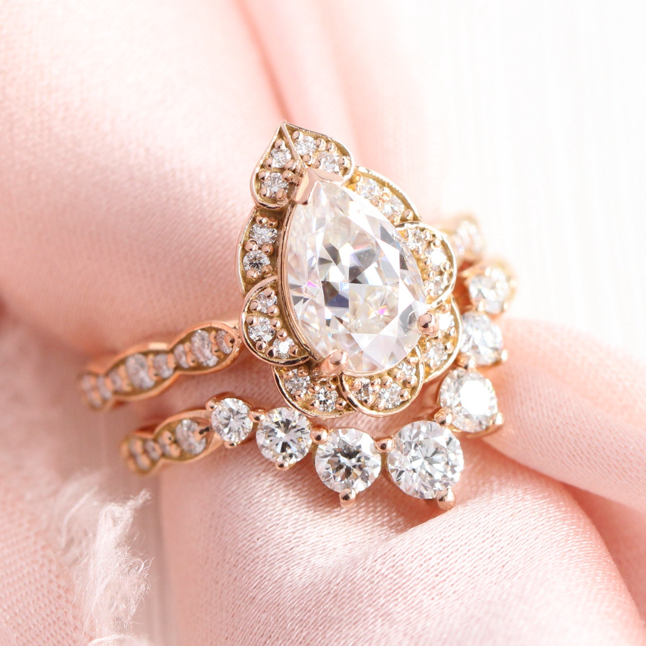 https://www.lamoredesign.com/cdn/shop/articles/Large_Vintage_Floral_Pear_Ring_Stack_with_the_Large_7_Diamond_Deep_Curved_Scalloped_Band_2200x.jpg?v=1649553624
