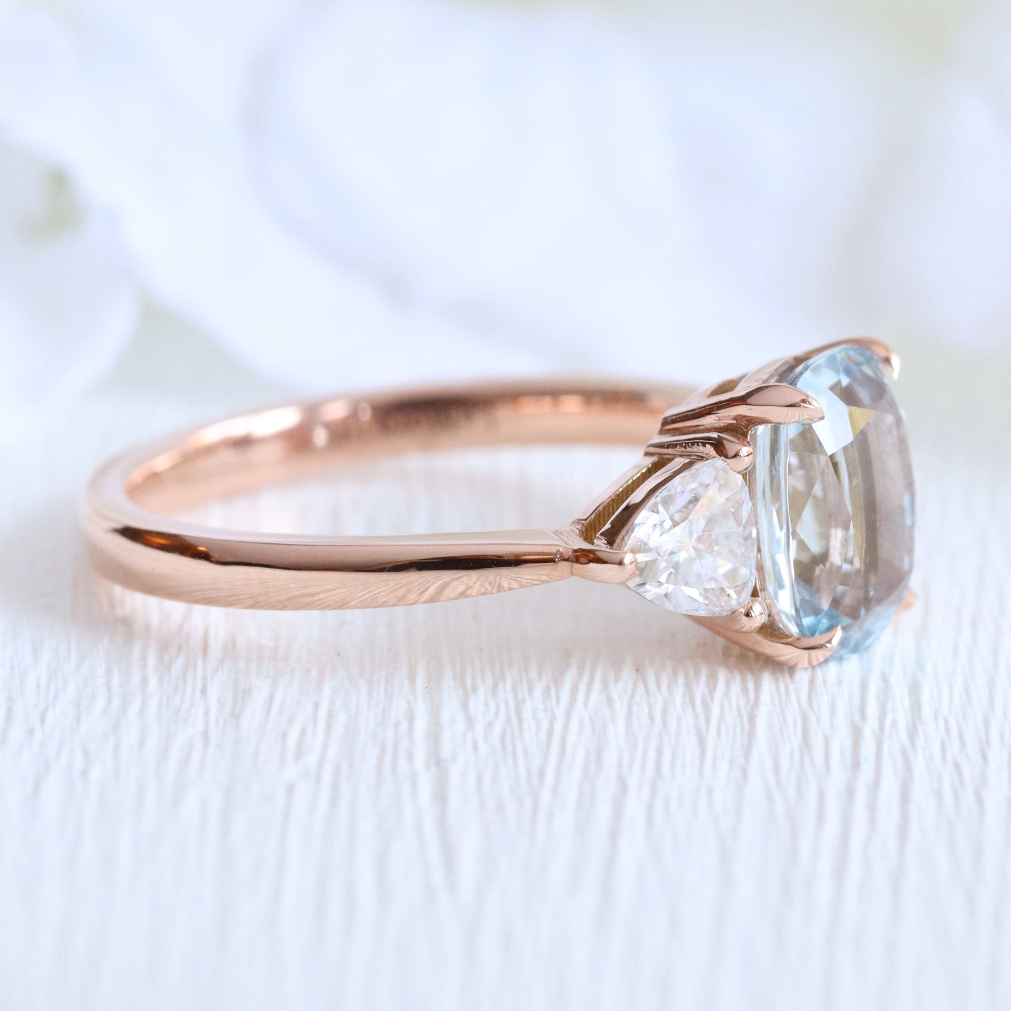 Cushion aqua blue sapphire ring rose gold 3 stone diamond ring la more design jewelry