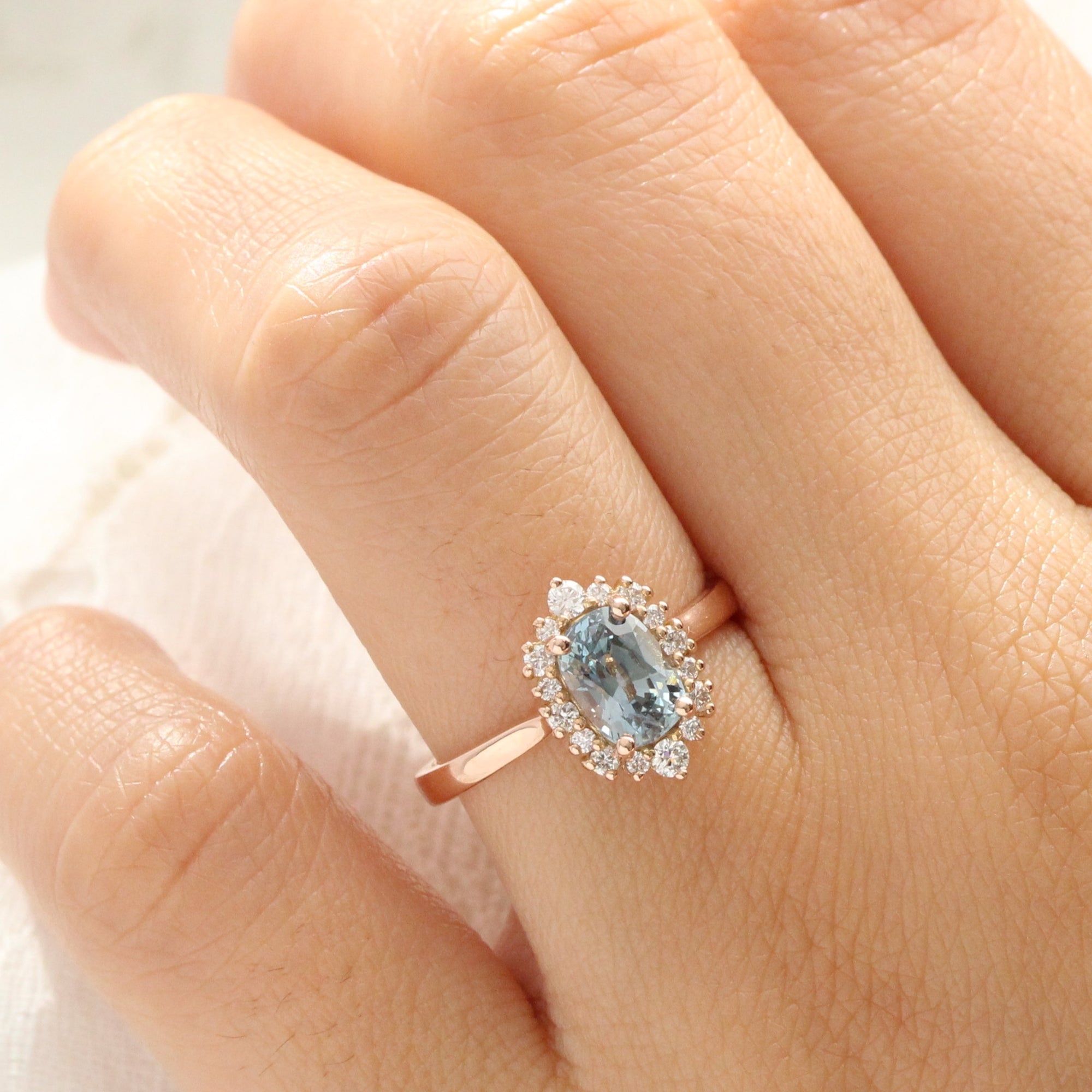 Cushion aqua blue sapphire ring rose gold halo diamond sapphire engagement ring la more design jewelry