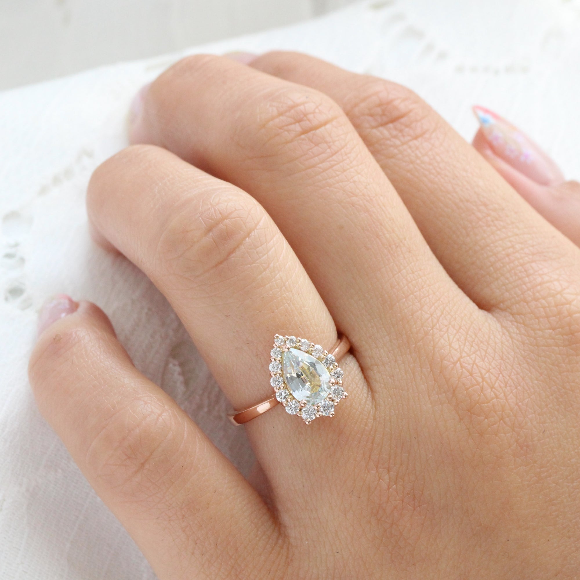 Halo diamond light aqua blue sapphire ring rose gold pear sapphire ring la more design jewelry