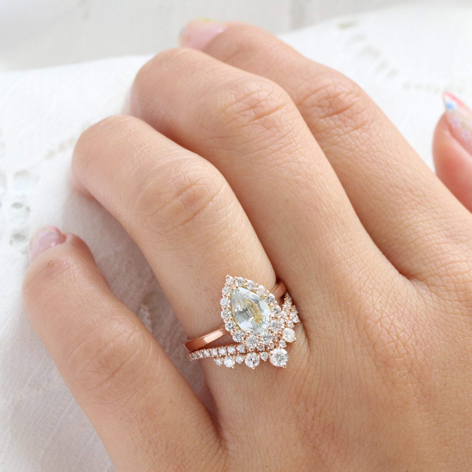 Halo diamond light aqua blue sapphire ring rose gold pear sapphire ring la more design jewelry