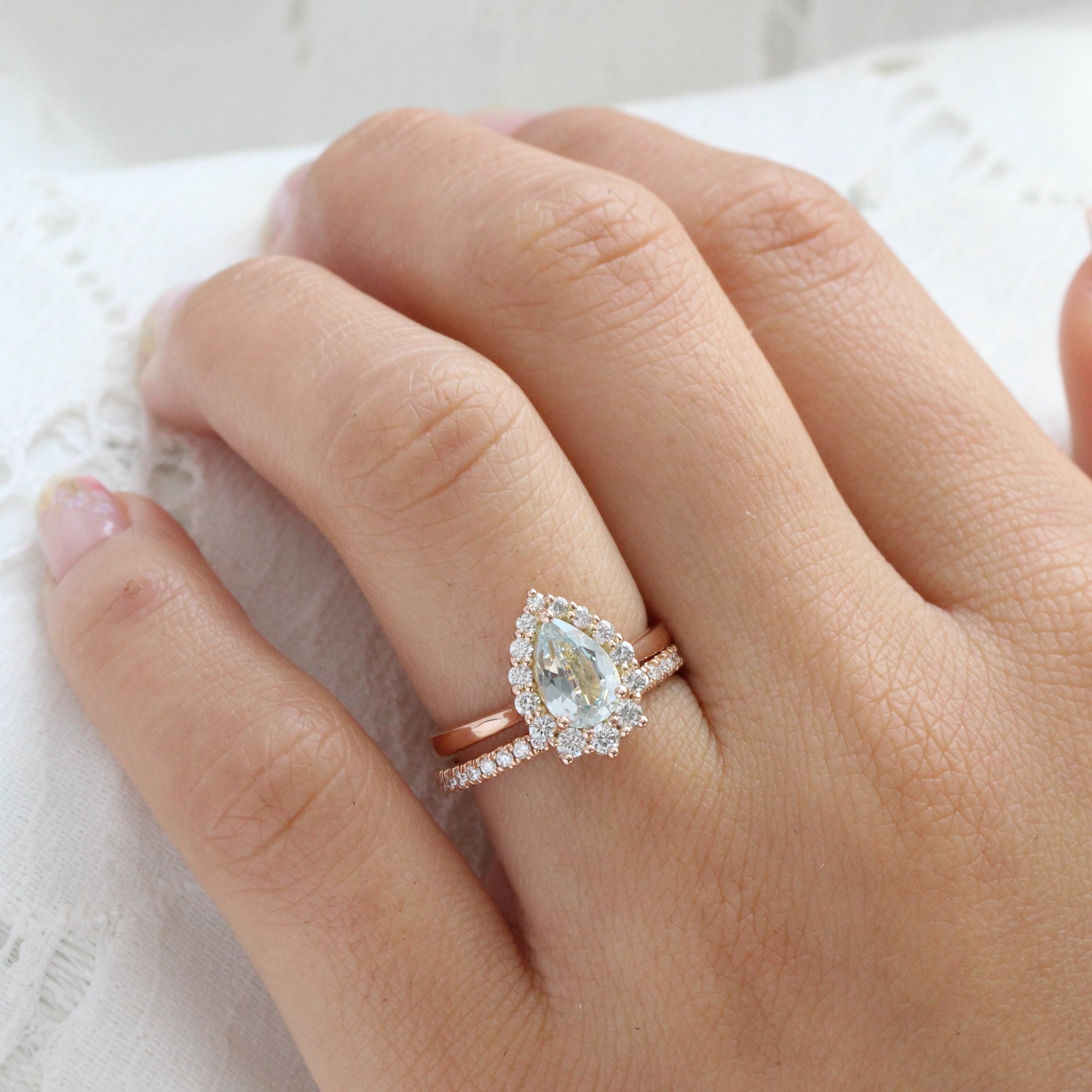 Halo diamond light aqua blue sapphire ring rose gold pear sapphire ring la more design jewelry