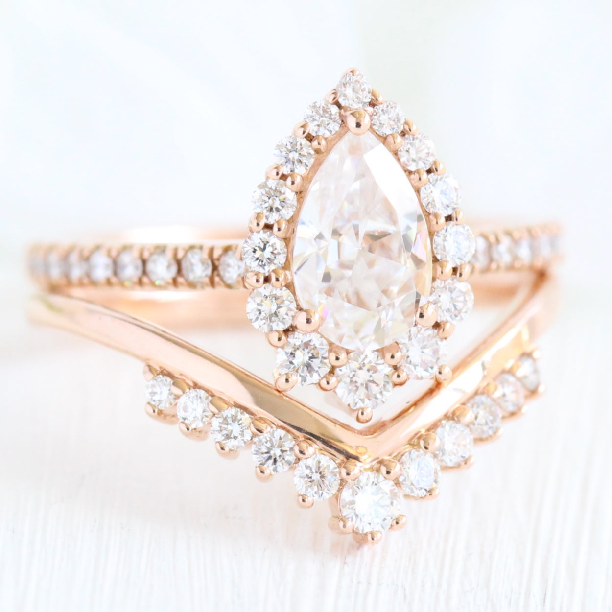 Halo diamond pear moissanite engagement ring rose gold bridal set v shaped wedding band la more design jewelry