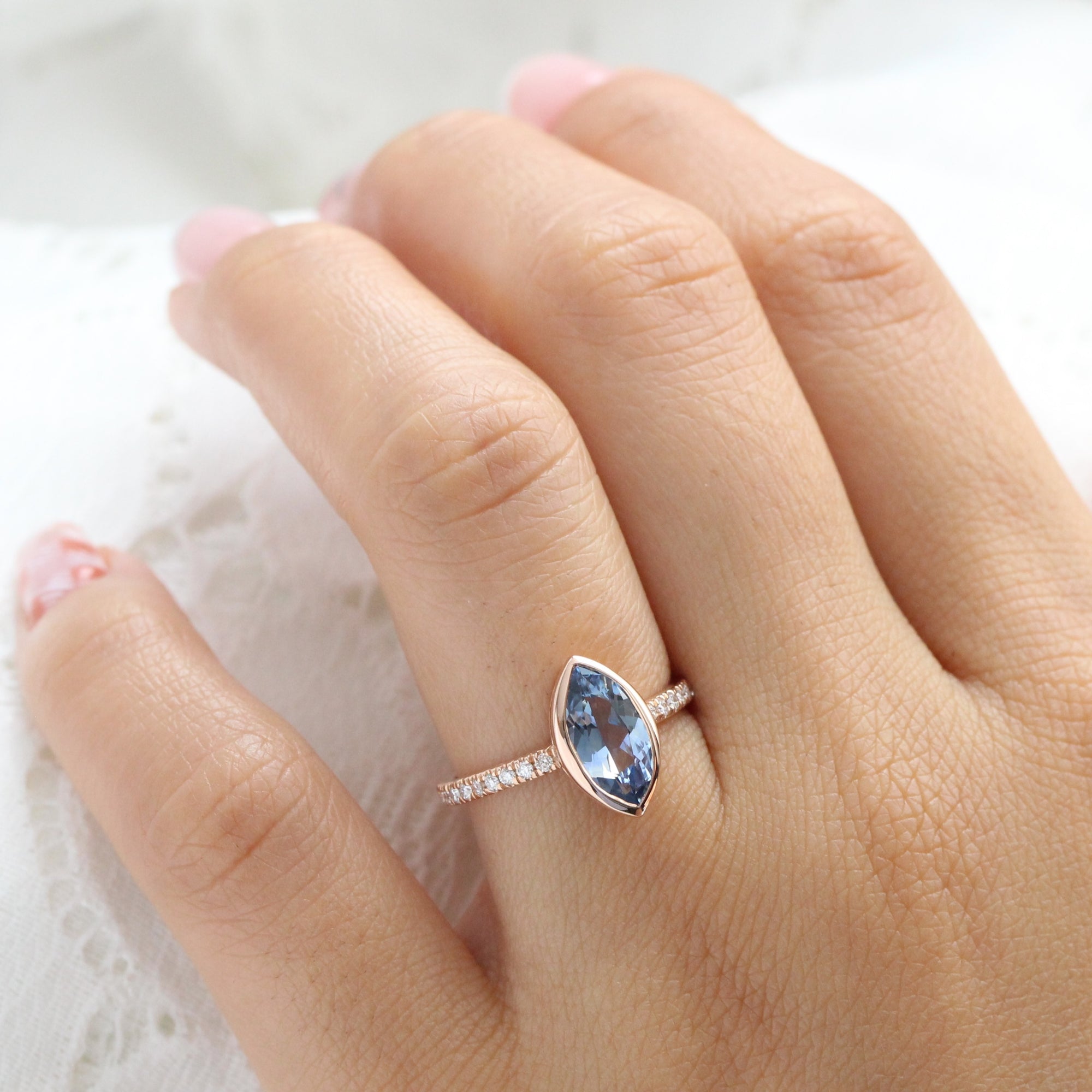 Marquise teal blue sapphire ring rose gold bezel solitaire pave diamond band la more design jewelry