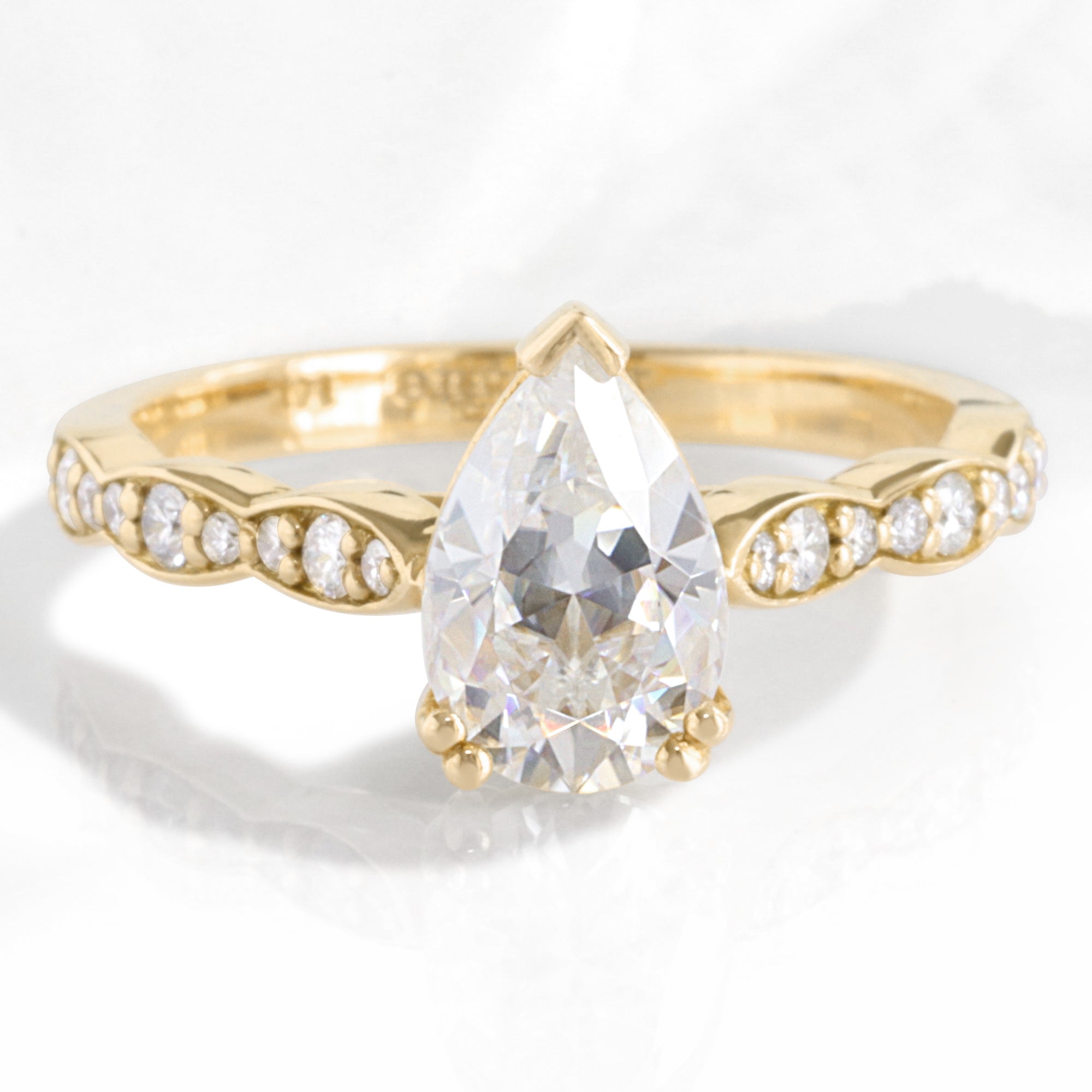 Pear moissanite diamond engagement ring yellow gold solitaire moissanite ring la more design jewelry