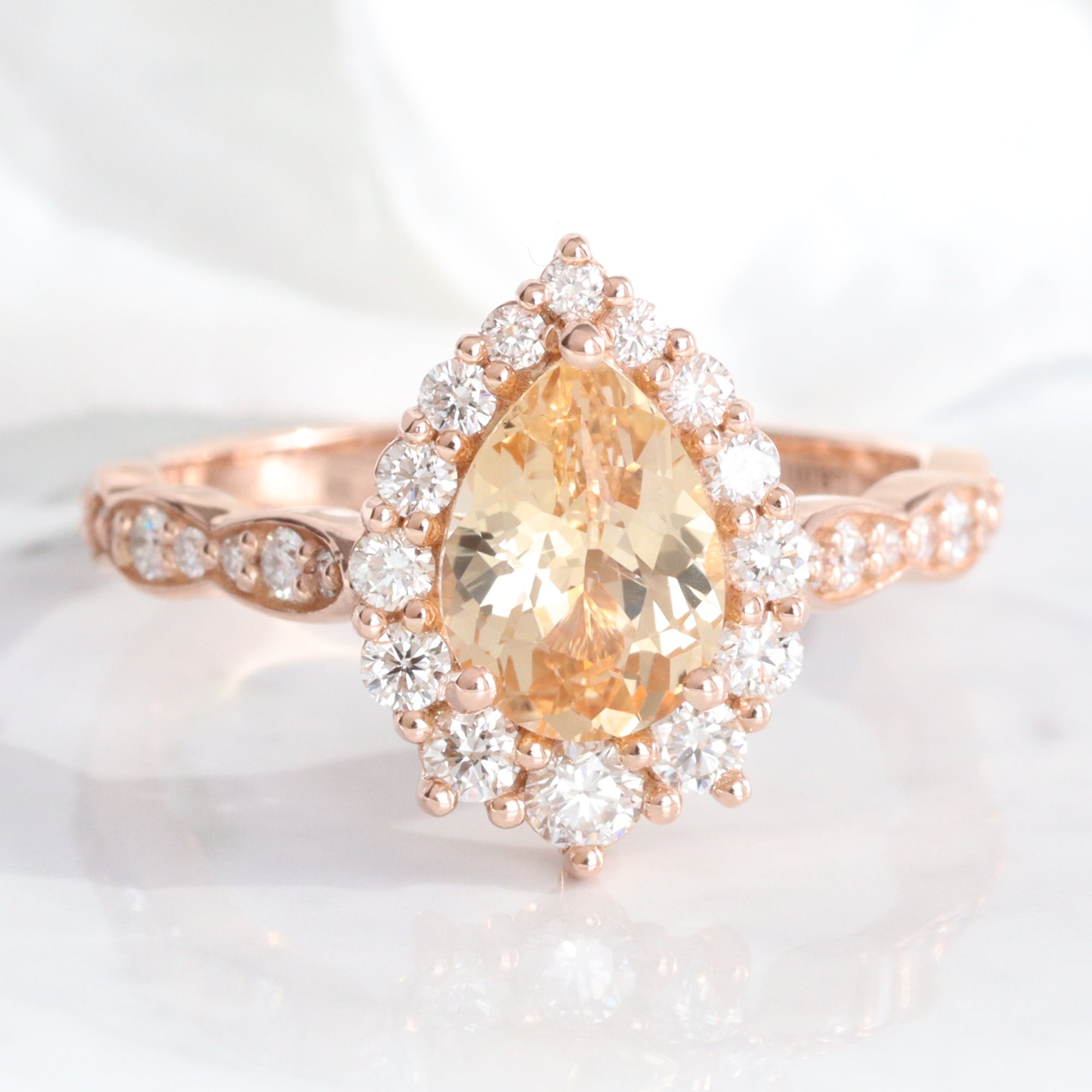 Pear peach yellow sapphire engagement ring rose gold halo diamond sapphire ring la more design jewelry