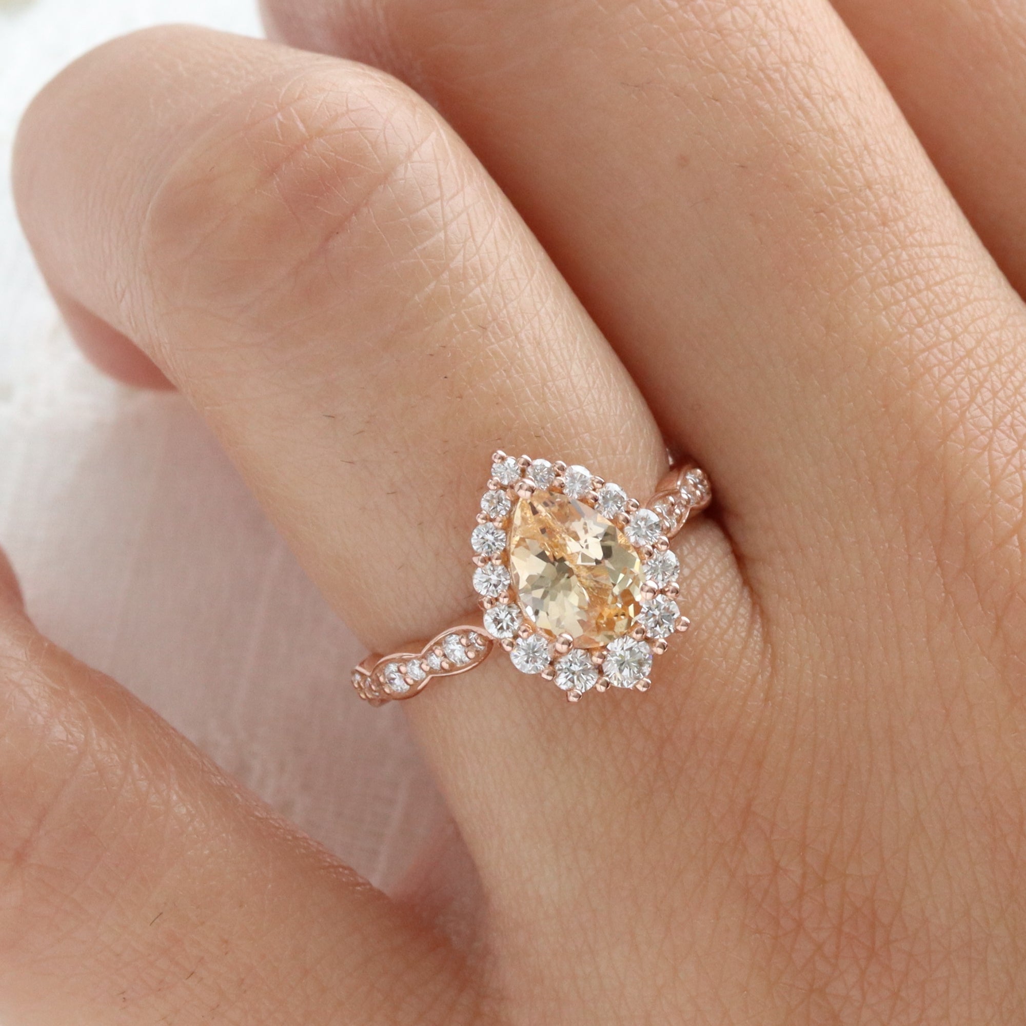 Pear peach yellow sapphire engagement ring rose gold halo diamond sapphire ring la more design jewelry