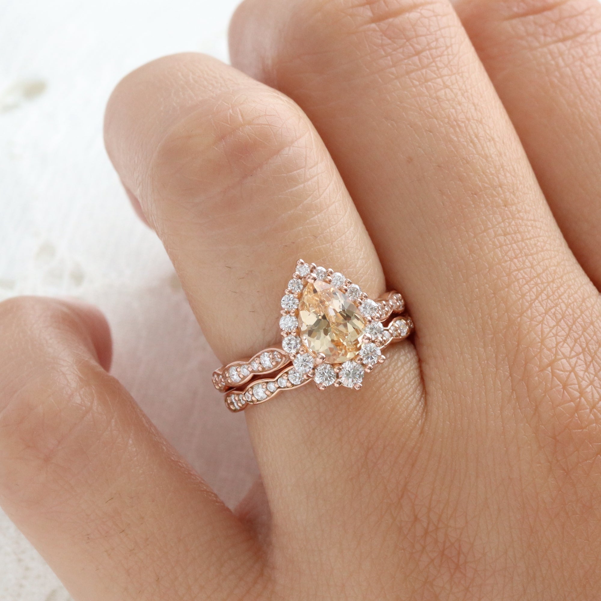 Pear peach yellow sapphire engagement ring rose gold halo diamond sapphire ring la more design jewelry