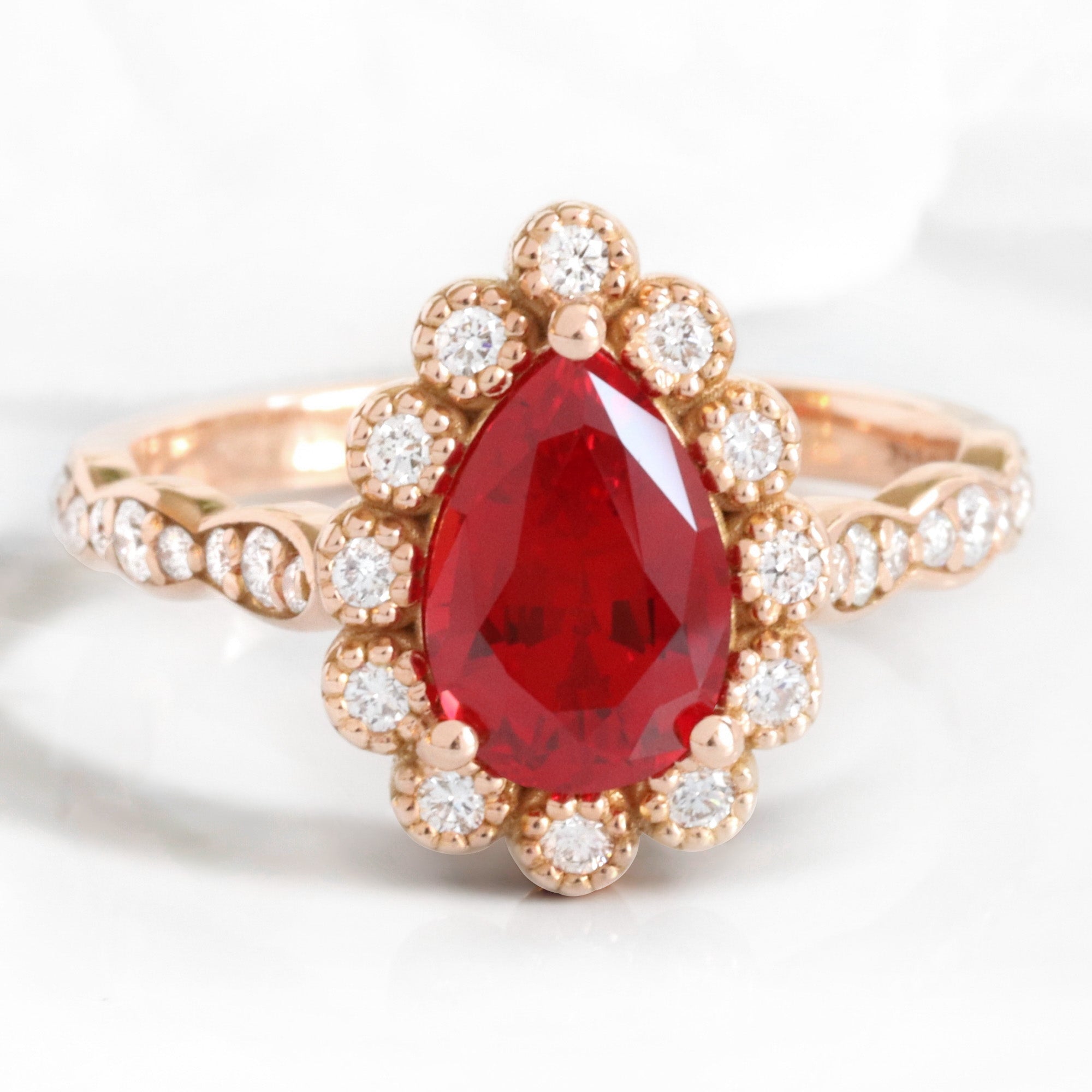 Pear ruby engagement ring rose gold vintage halo diamond ruby ring la more design jewelry