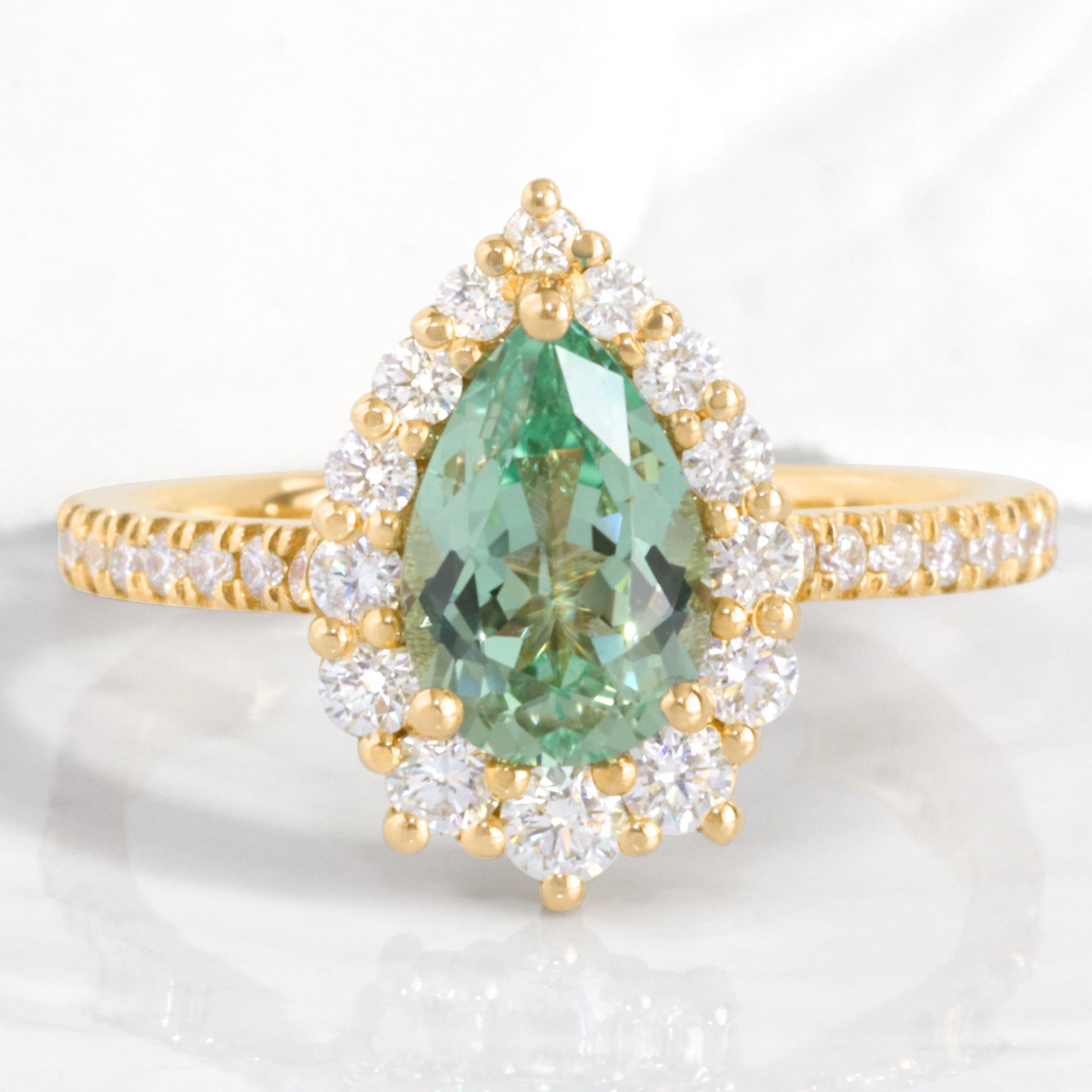 Pear green sapphire engagement ring yellow gold halo diamond sapphire ring la more design 