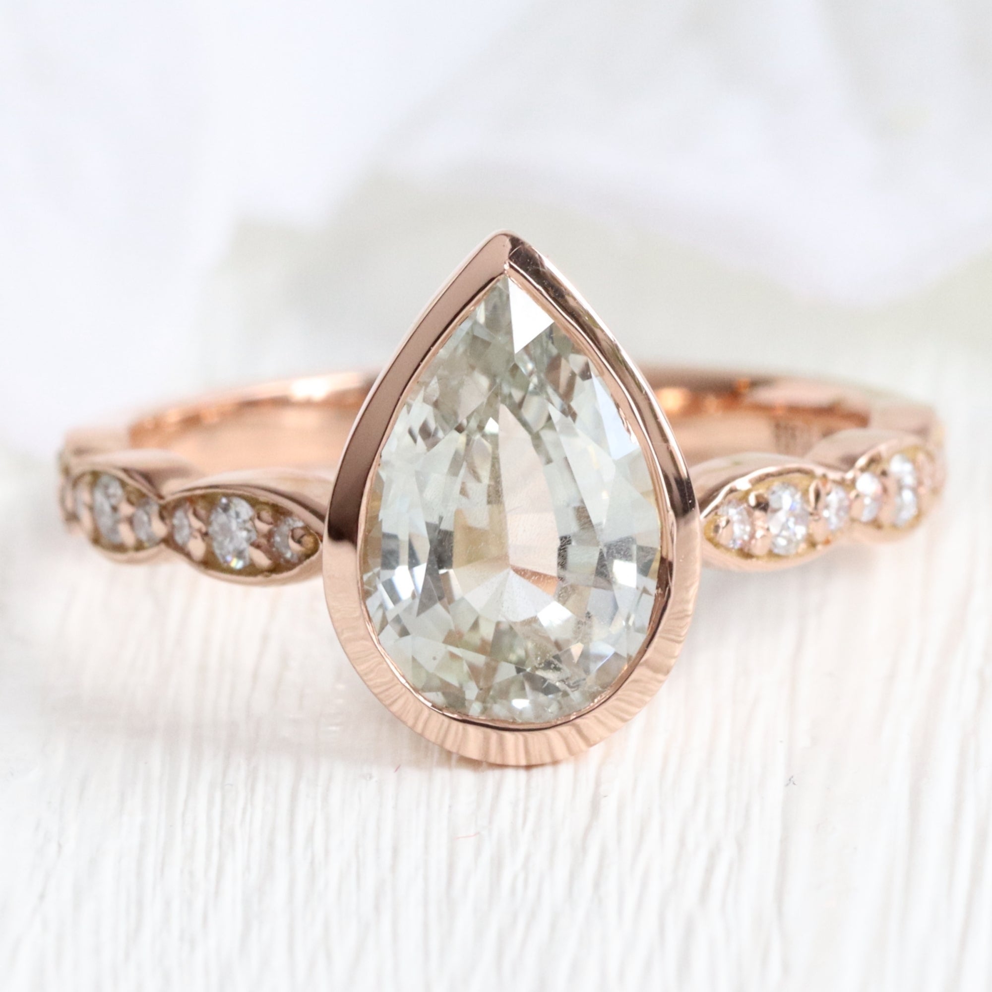 Pear seaform green sapphire ring rose gold bezel solitaire scalloped diamond band la more design jewelry