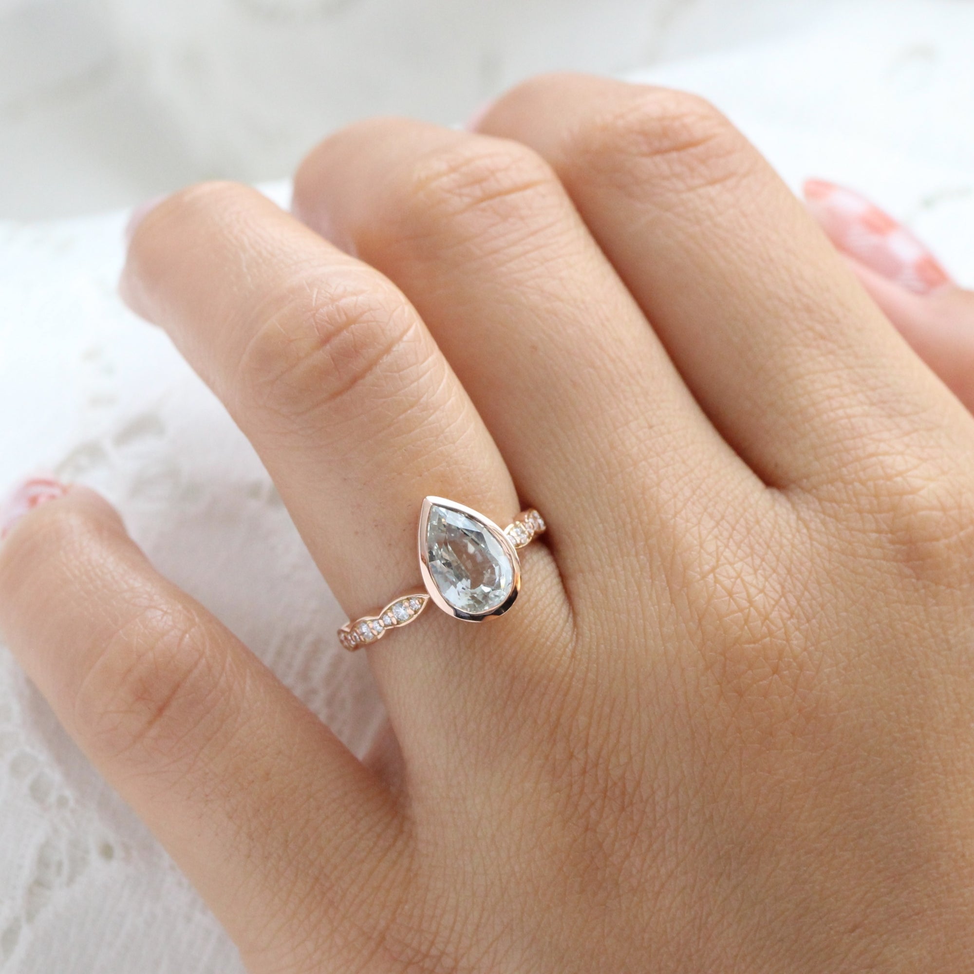 Pear seaform green sapphire ring rose gold bezel solitaire scalloped diamond band la more design jewelry