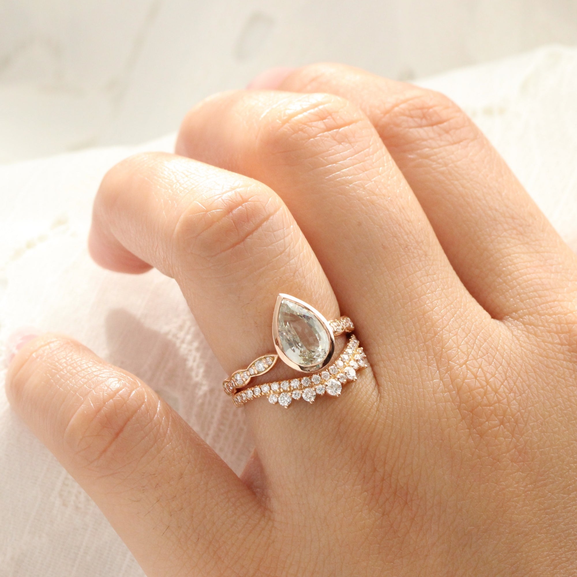 Pear seaform green sapphire ring rose gold bezel solitaire scalloped diamond band la more design jewelry