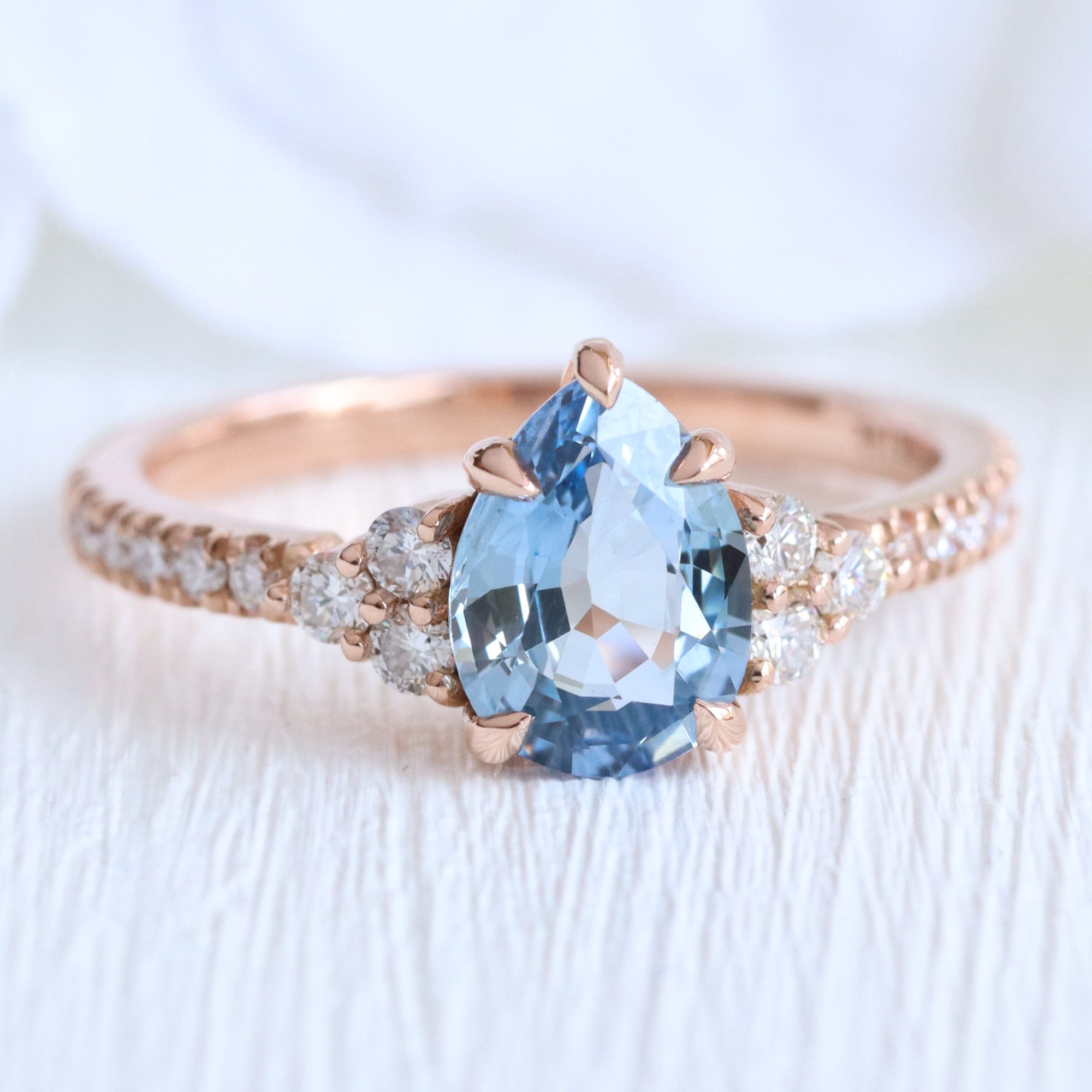 Pear teal blue sapphire ring rose gold 3 stone diamond ring la more design jewelry