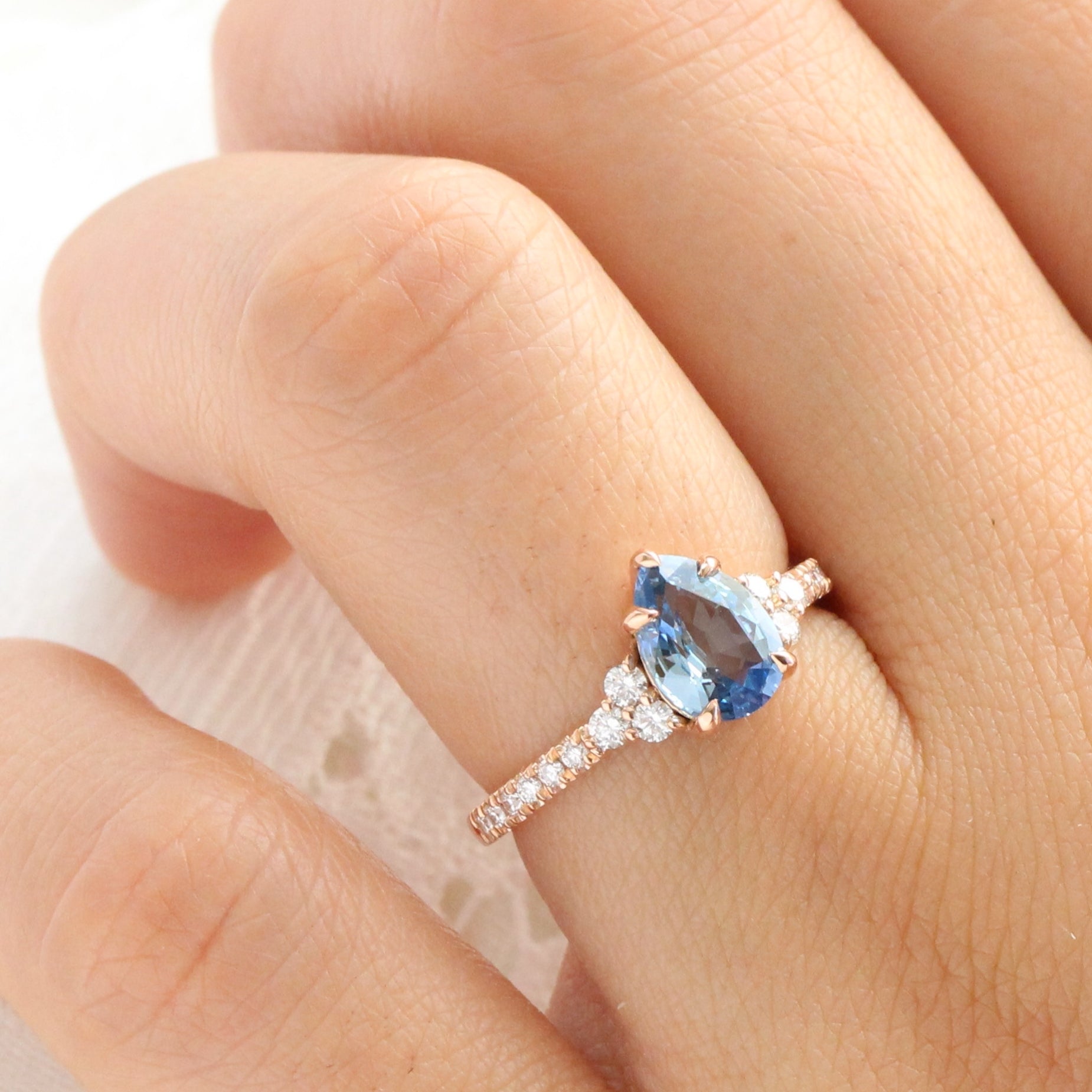 Pear teal blue sapphire ring rose gold 3 stone diamond ring la more design jewelry