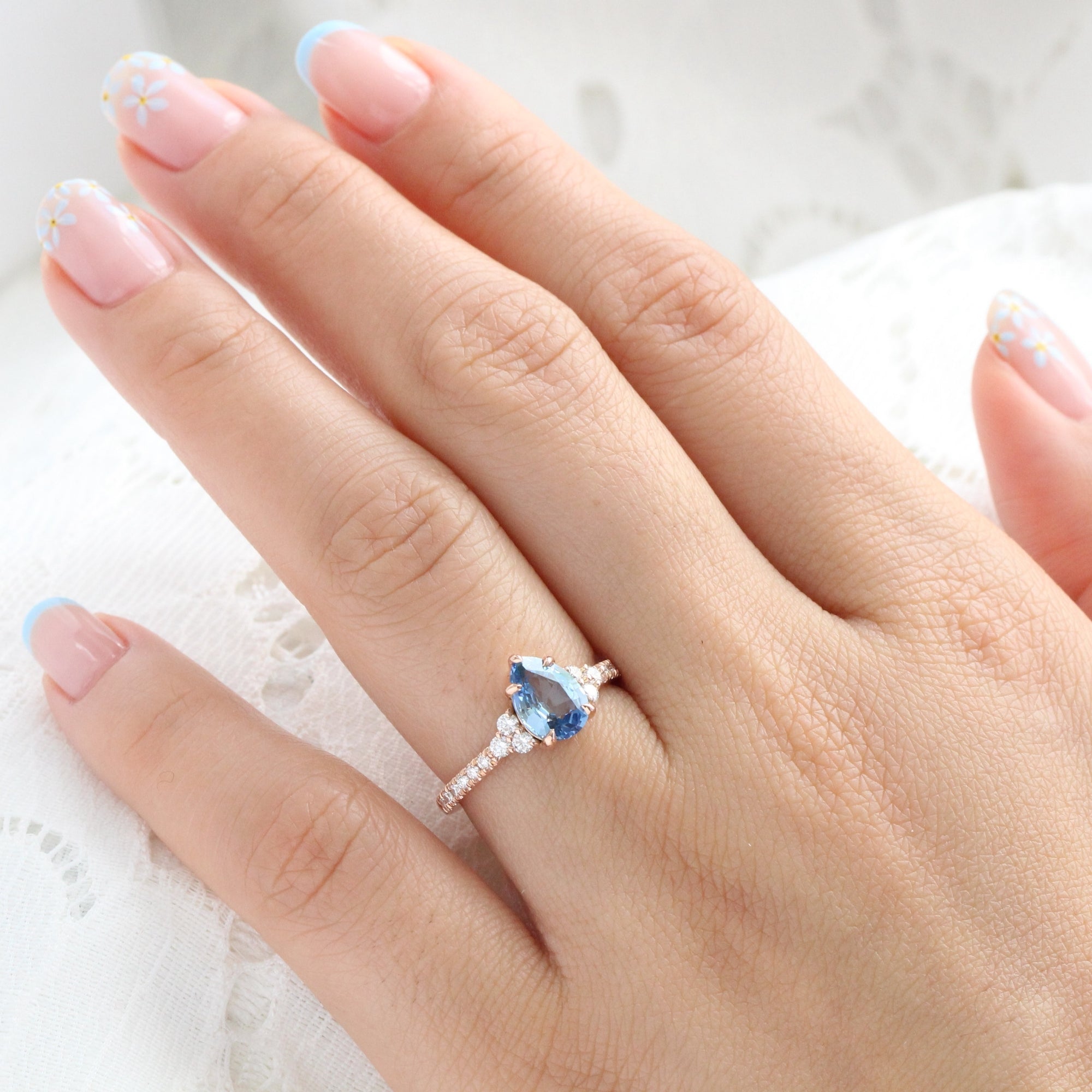 Pear teal blue sapphire ring rose gold 3 stone diamond ring la more design jewelry