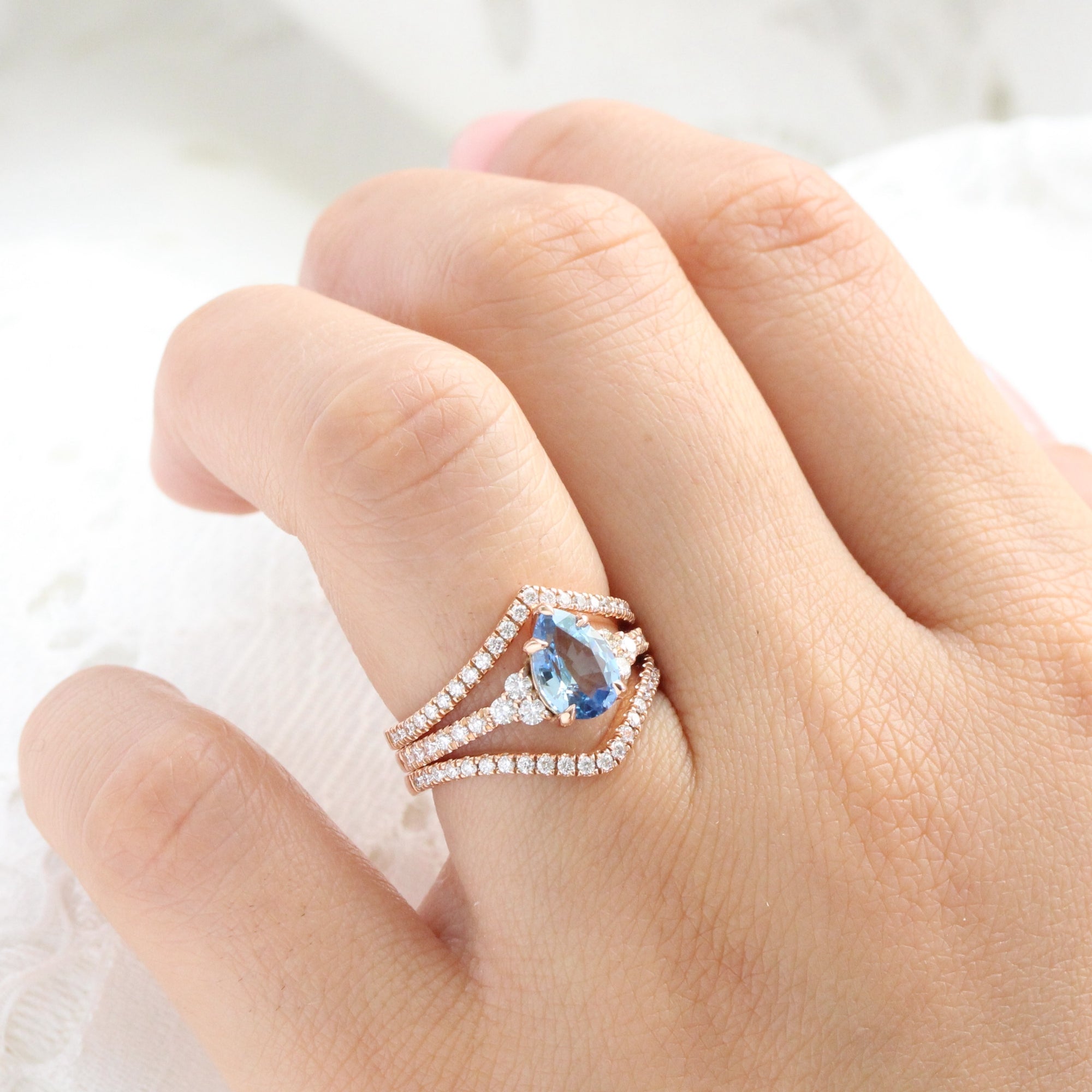 Pear teal blue sapphire ring rose gold 3 stone diamond ring la more design jewelry