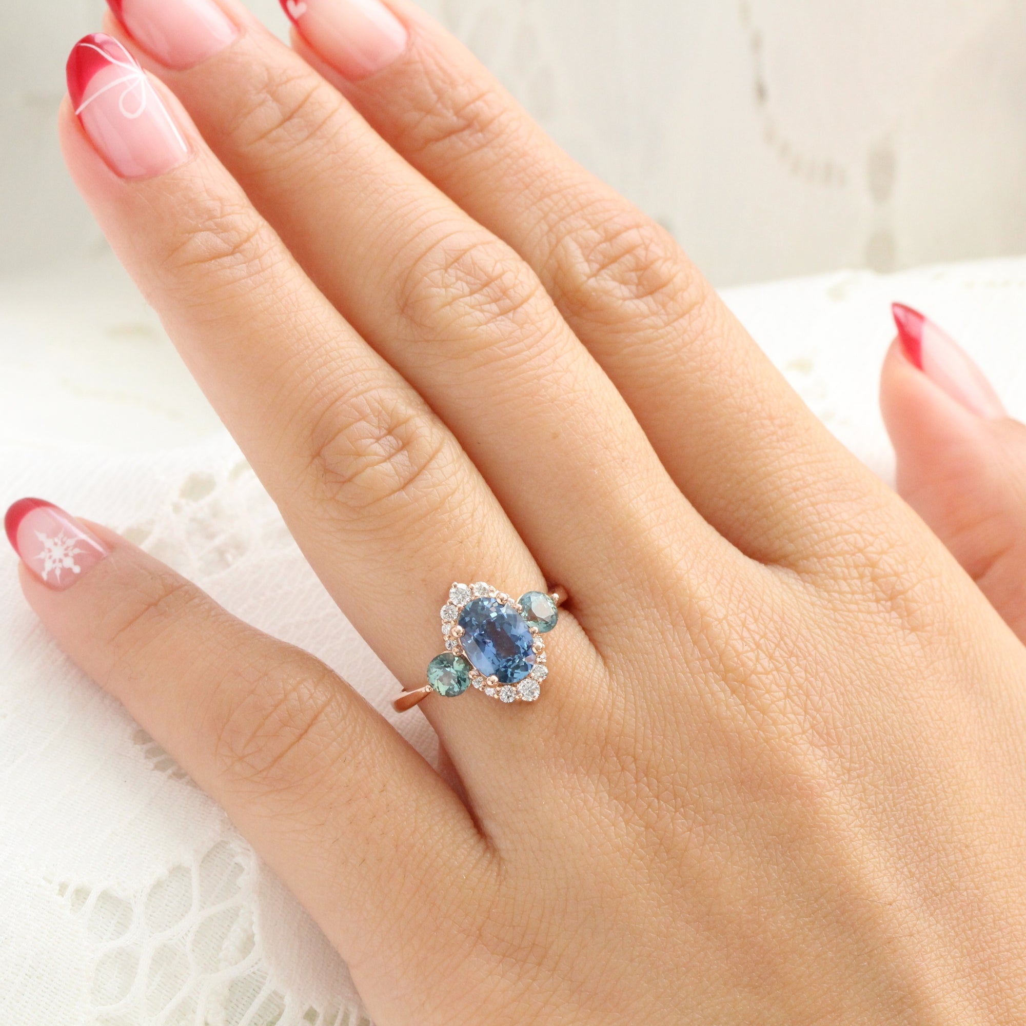 Unique teal blue sapphire ring rose gold diamond halo 3 stone ring la more design jewelry