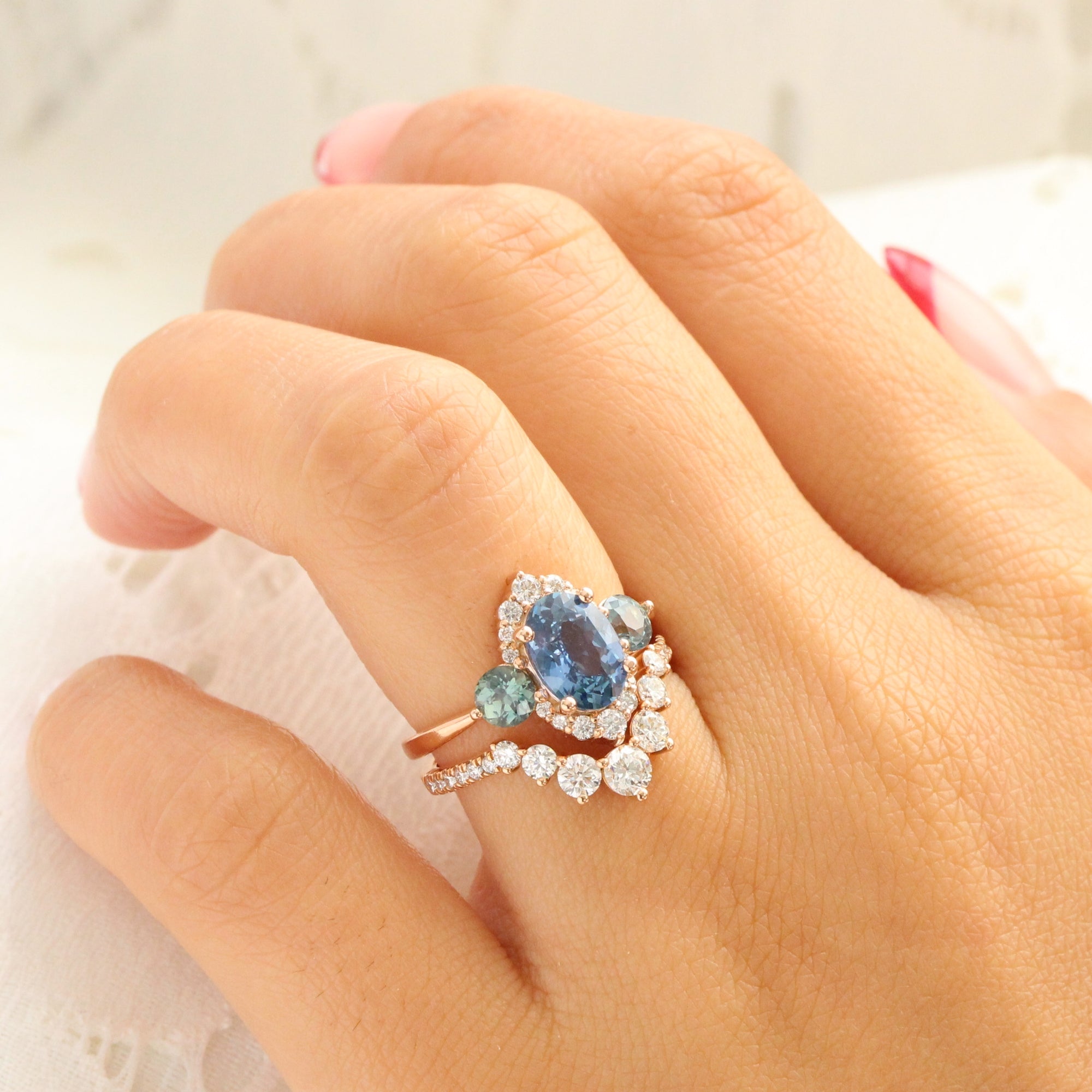 Unique teal blue sapphire ring rose gold diamond halo 3 stone ring la more design jewelry