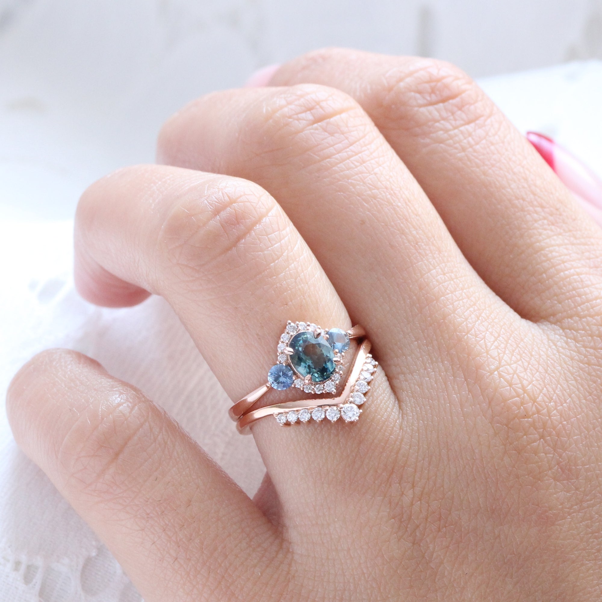 Unique teal blue sapphire ring rose gold diamond halo 3 stone ring la more design jewelry