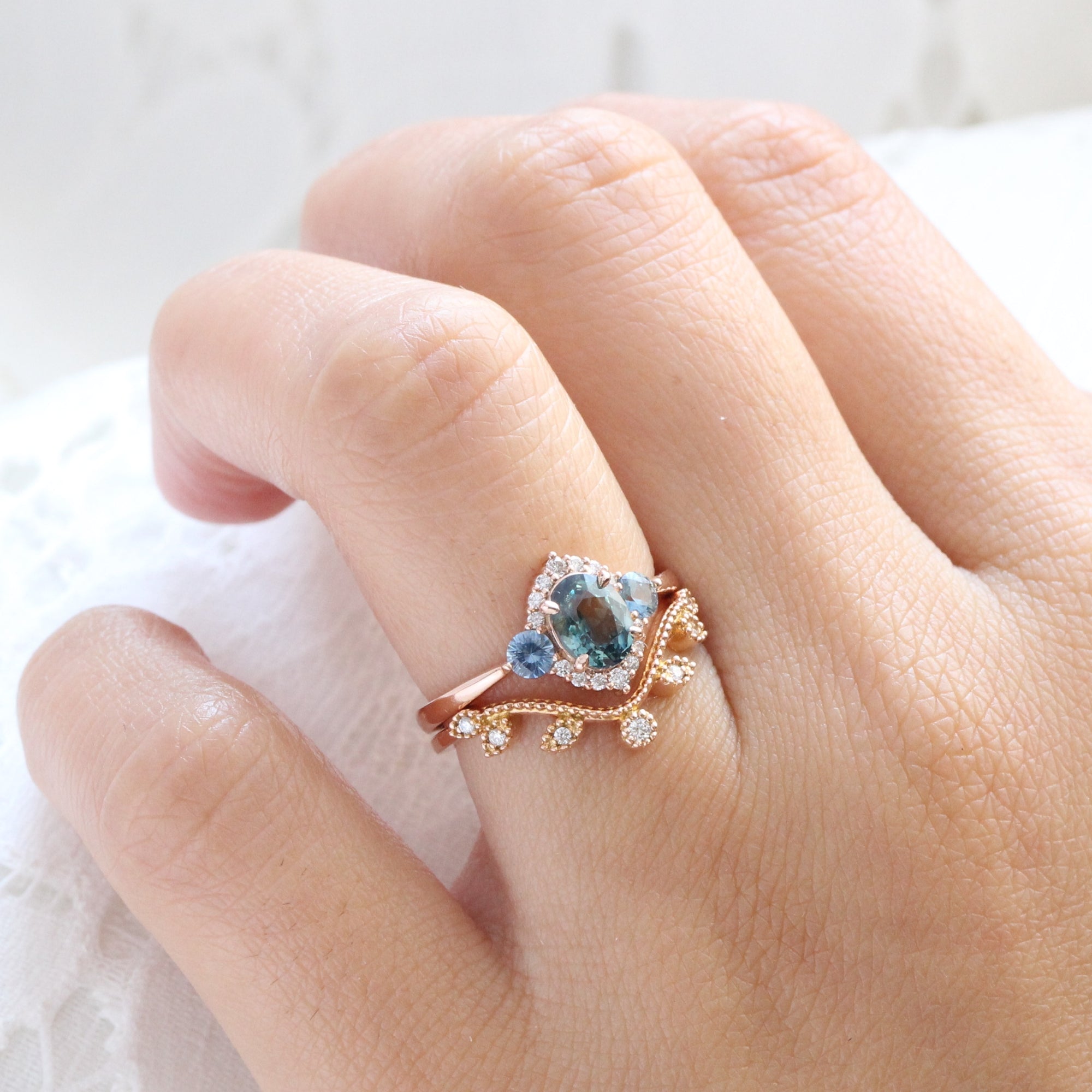 Unique teal blue sapphire ring rose gold diamond halo 3 stone ring la more design jewelry