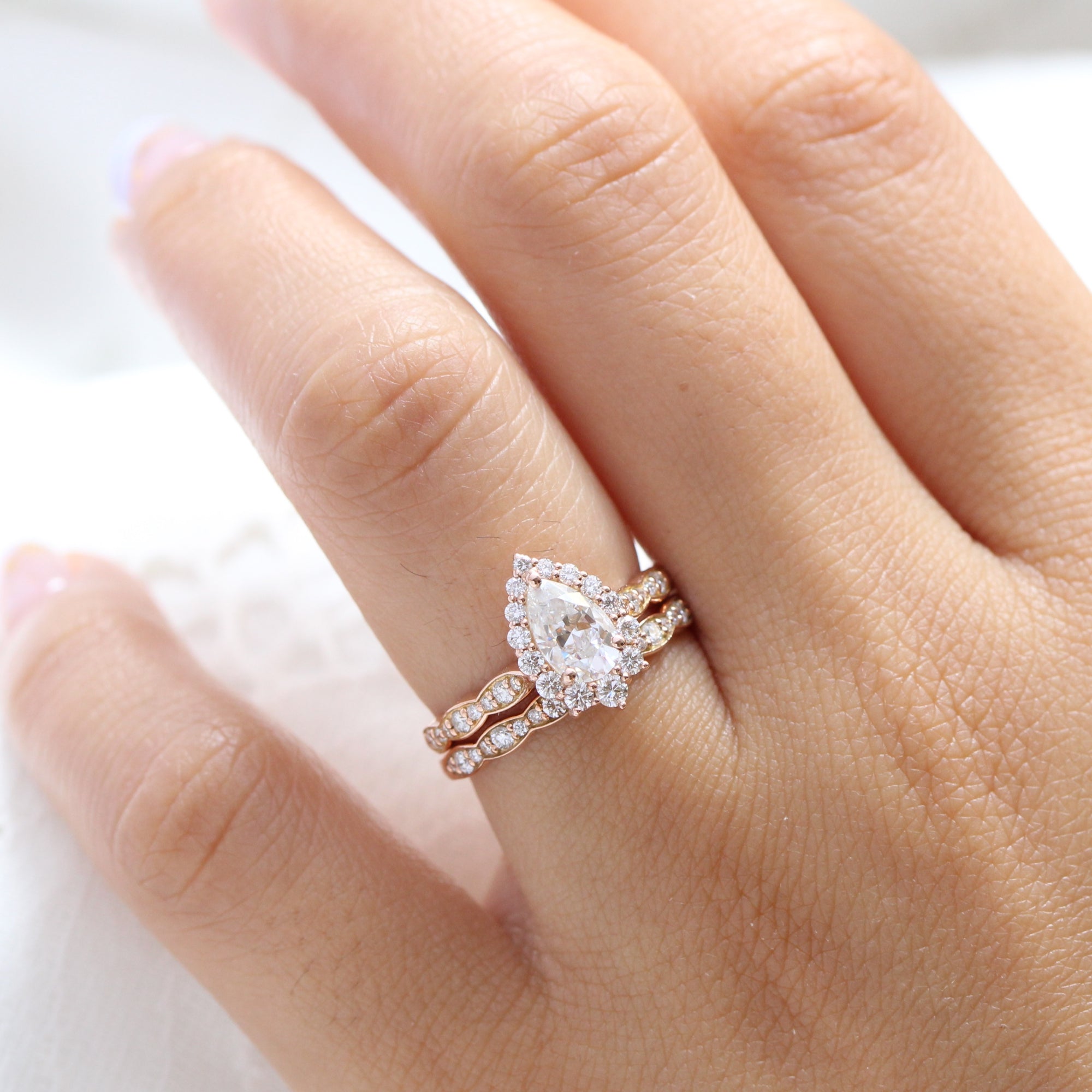 halo diamond pear moissanite engagement ring rose gold bridal set cluster ring la more design 