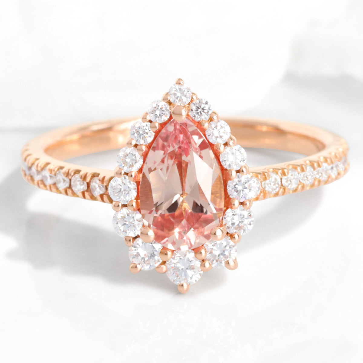 pear shaped peach sapphire engagement ring rose gold halo diamond pink sapphire ring la more design jewelry