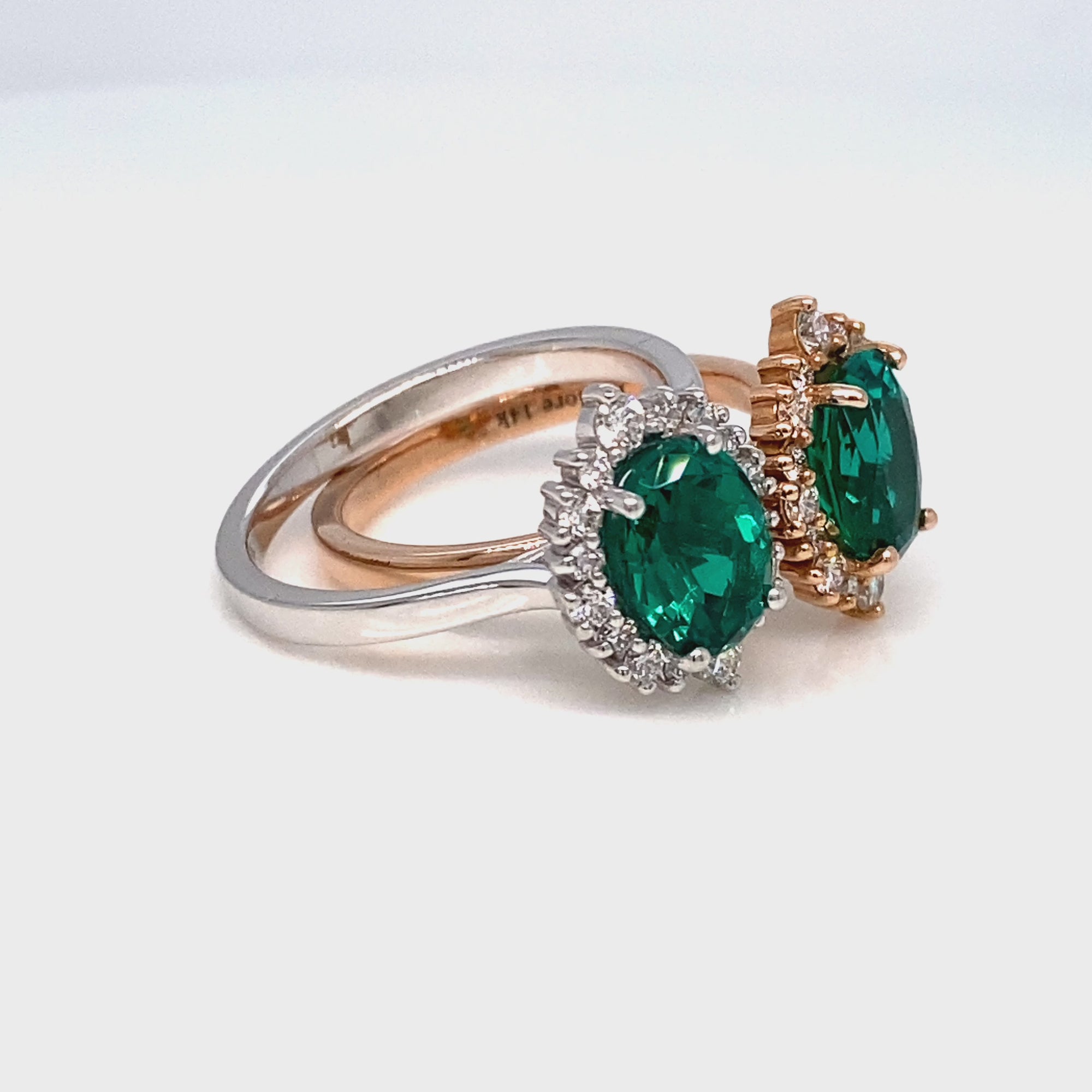 Oval Emerald Engagement Ring in Tiara Halo Diamond Tapered Band