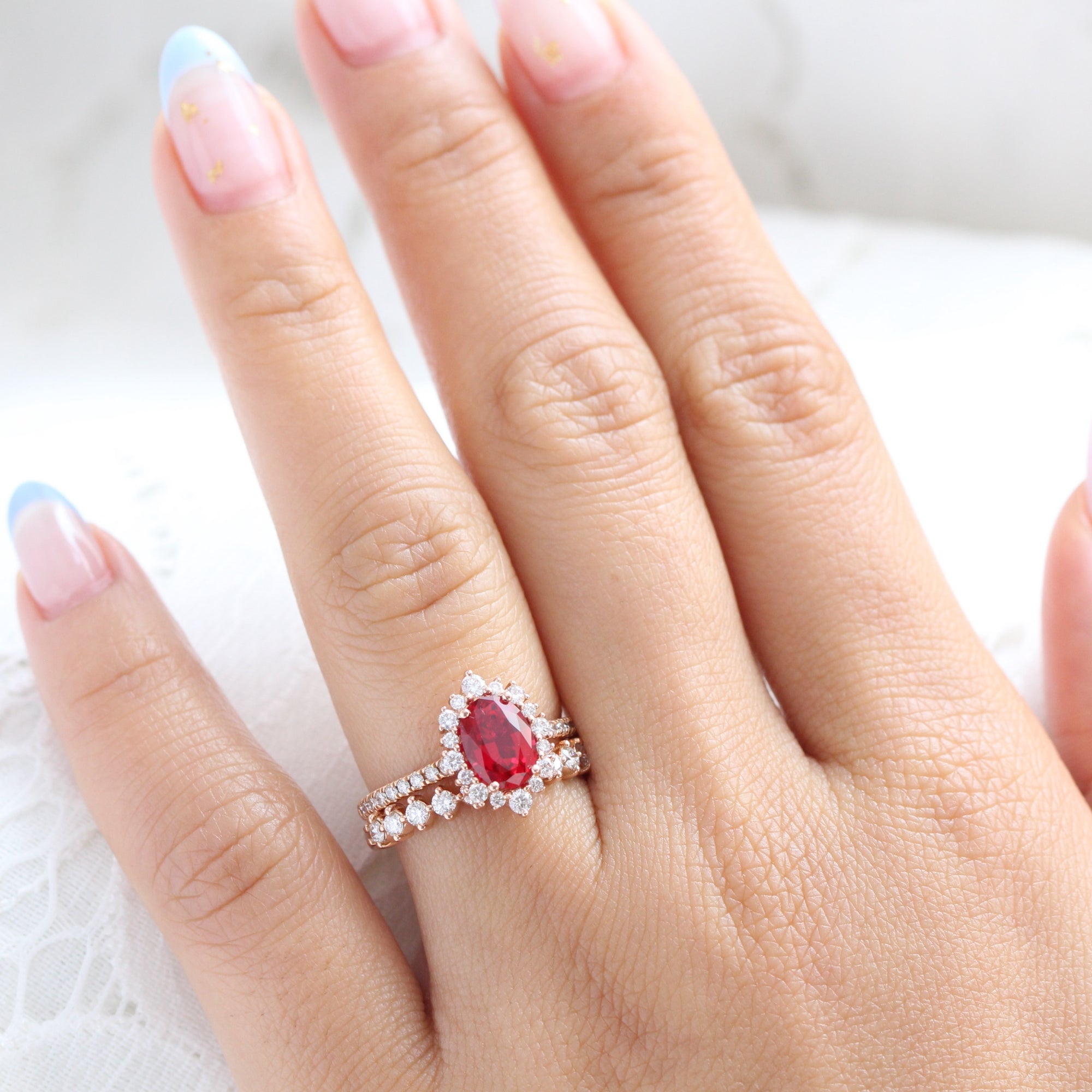 Halo diamond oval ruby ring stack rose gold eternity diamond wedding band la more design jewelry