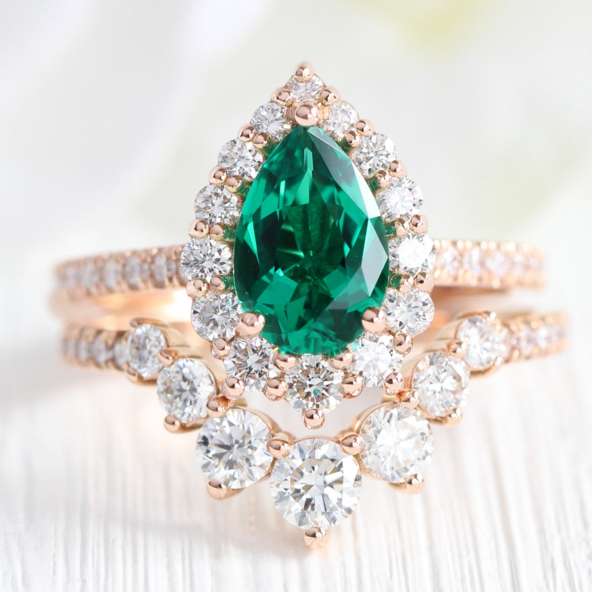 Halo diamond pear emerald ring stock rose gold deep curved wedding band la more design jewelry