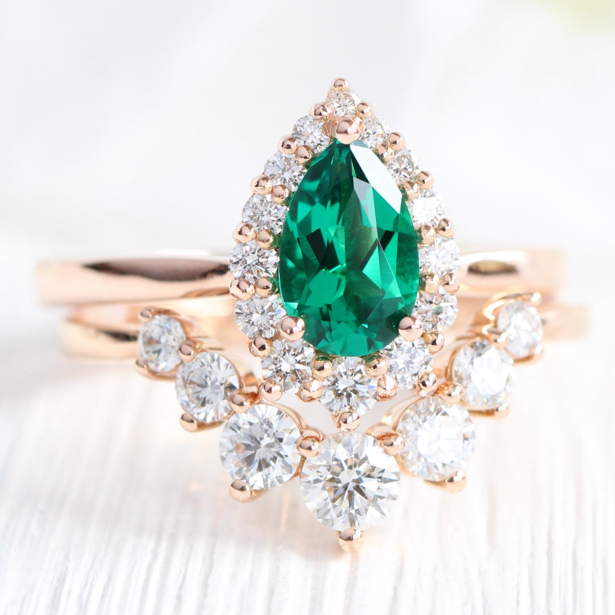 Halo diamond pear emerald ring stock rose gold deep curved wedding band la more design jewelry