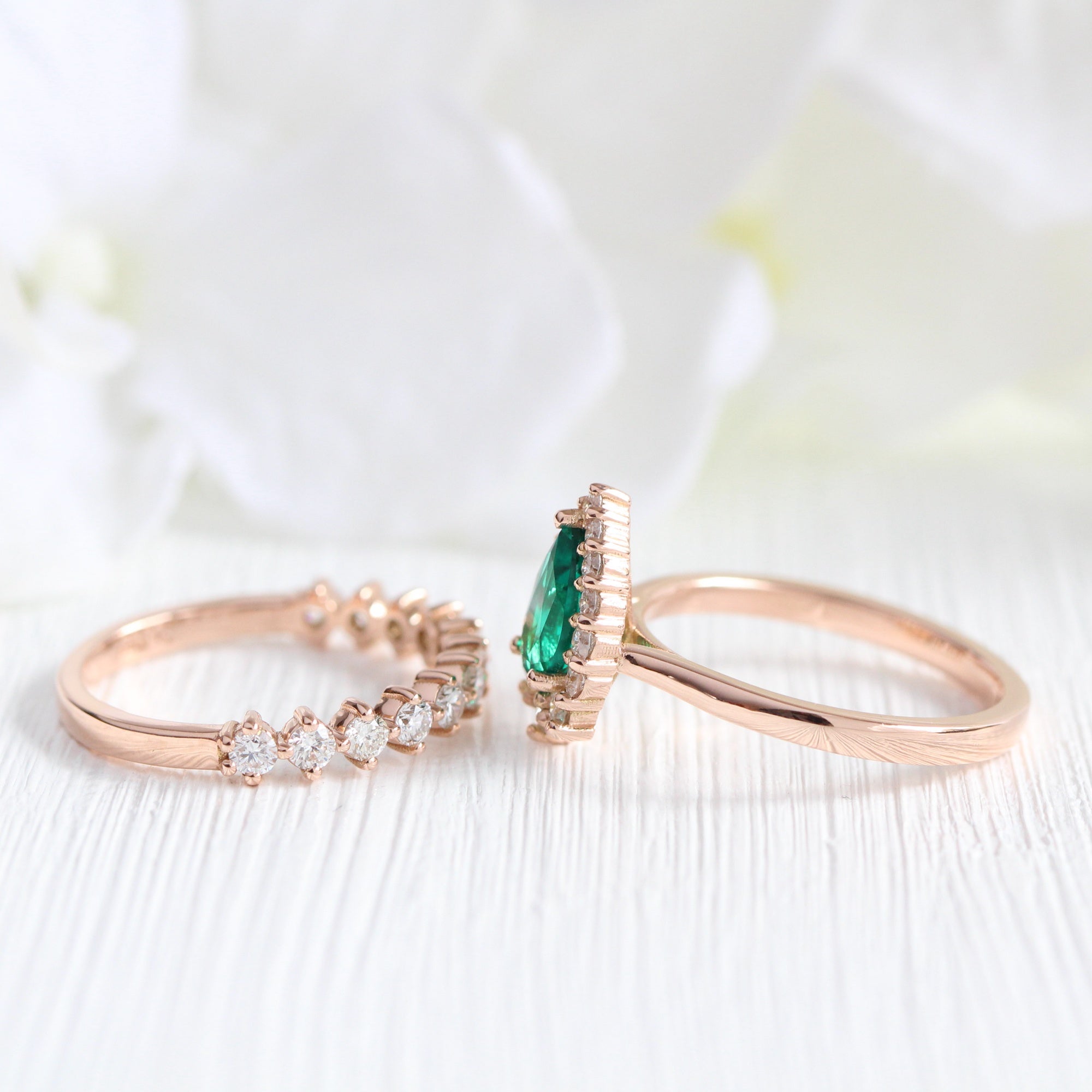 Halo diamond pear emerald ring stock rose gold half eternity wedding band la more design jewelry