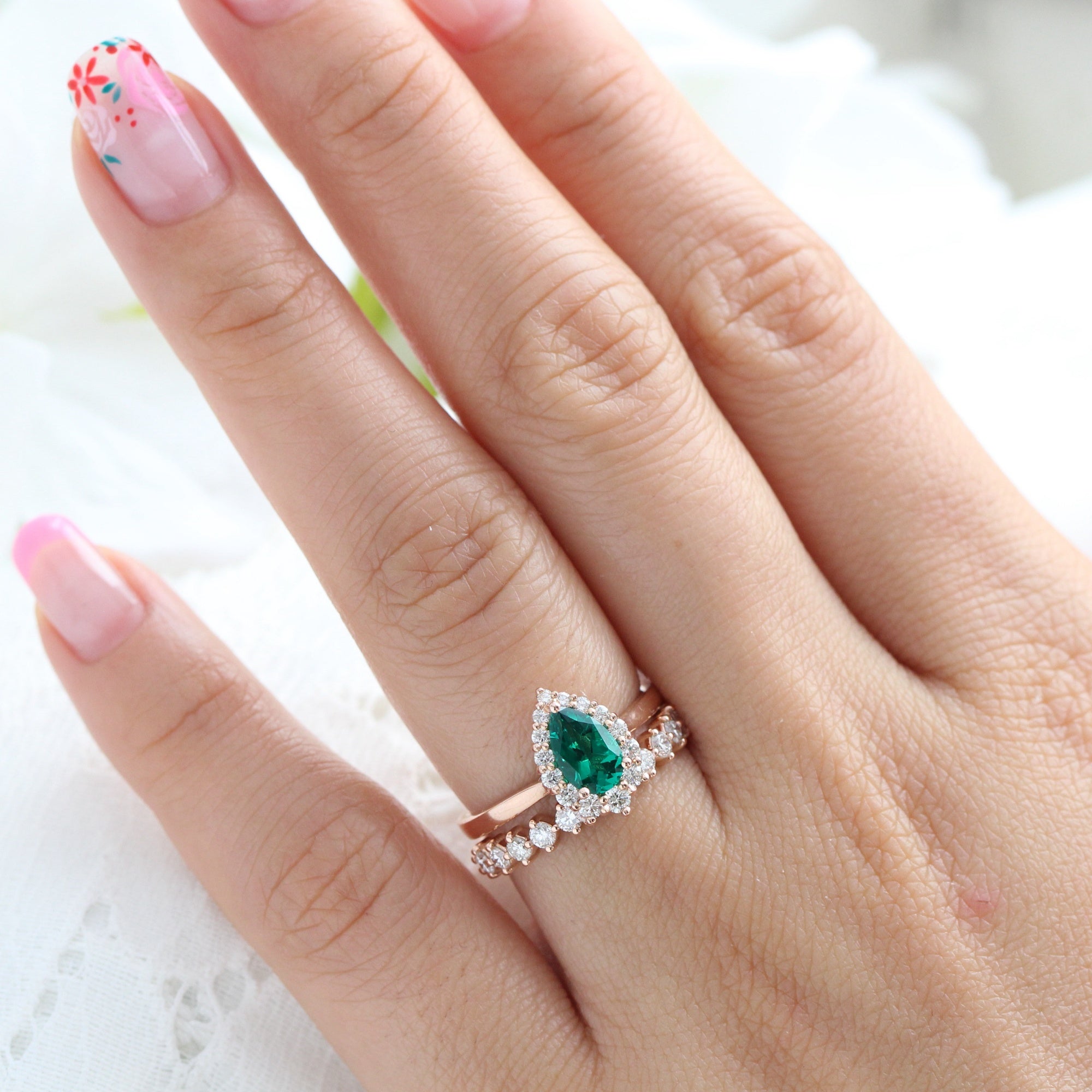 Halo diamond pear emerald ring stock rose gold half eternity wedding band la more design jewelry