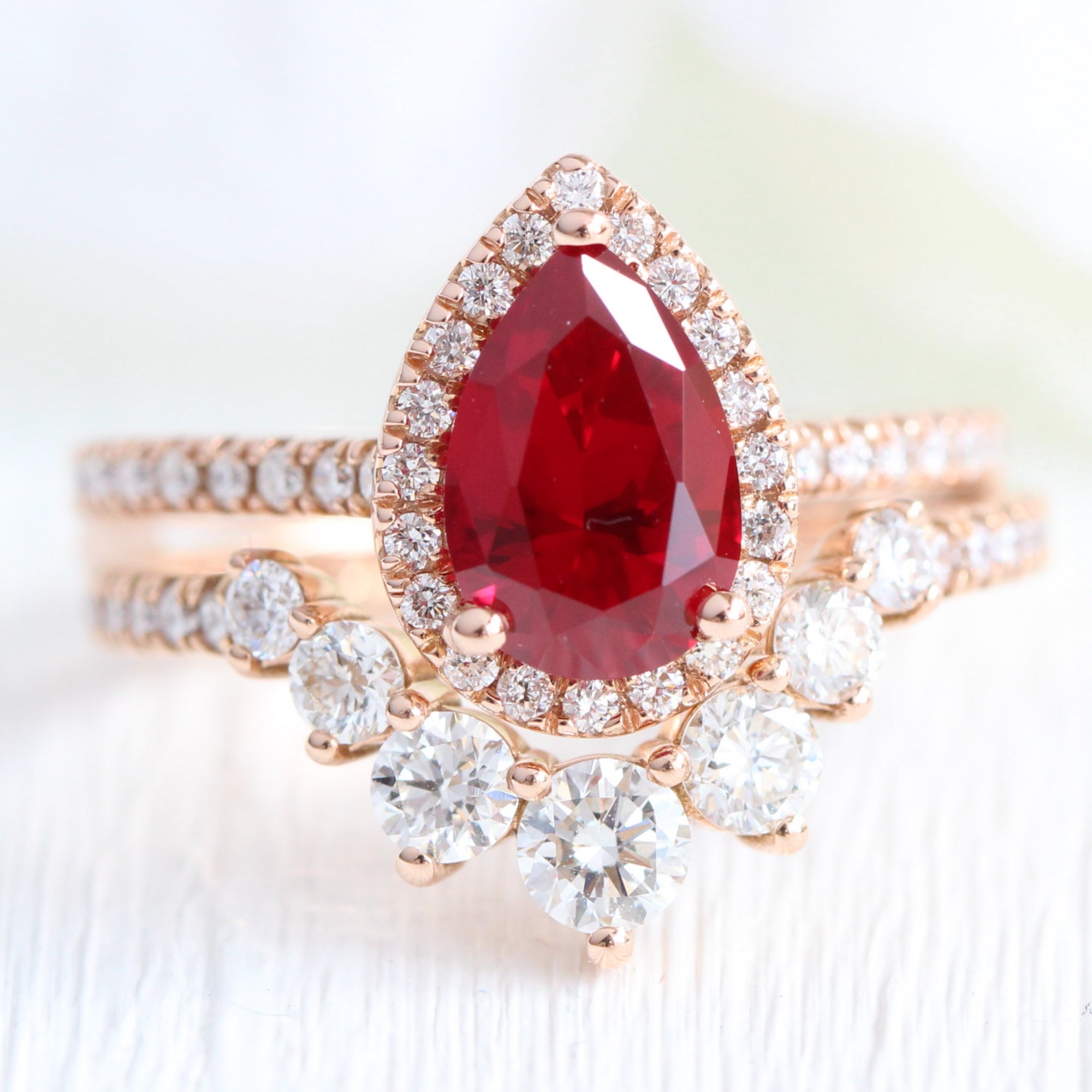 Halo diamond pear ruby ring stack rose gold deep curved diamond wedding band la more design jewelry