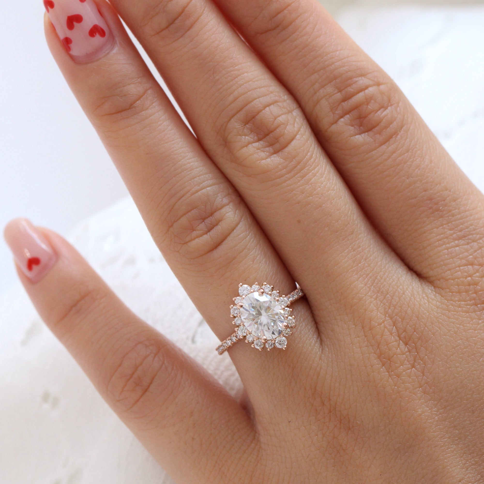 Oval starburst on sale engagement ring