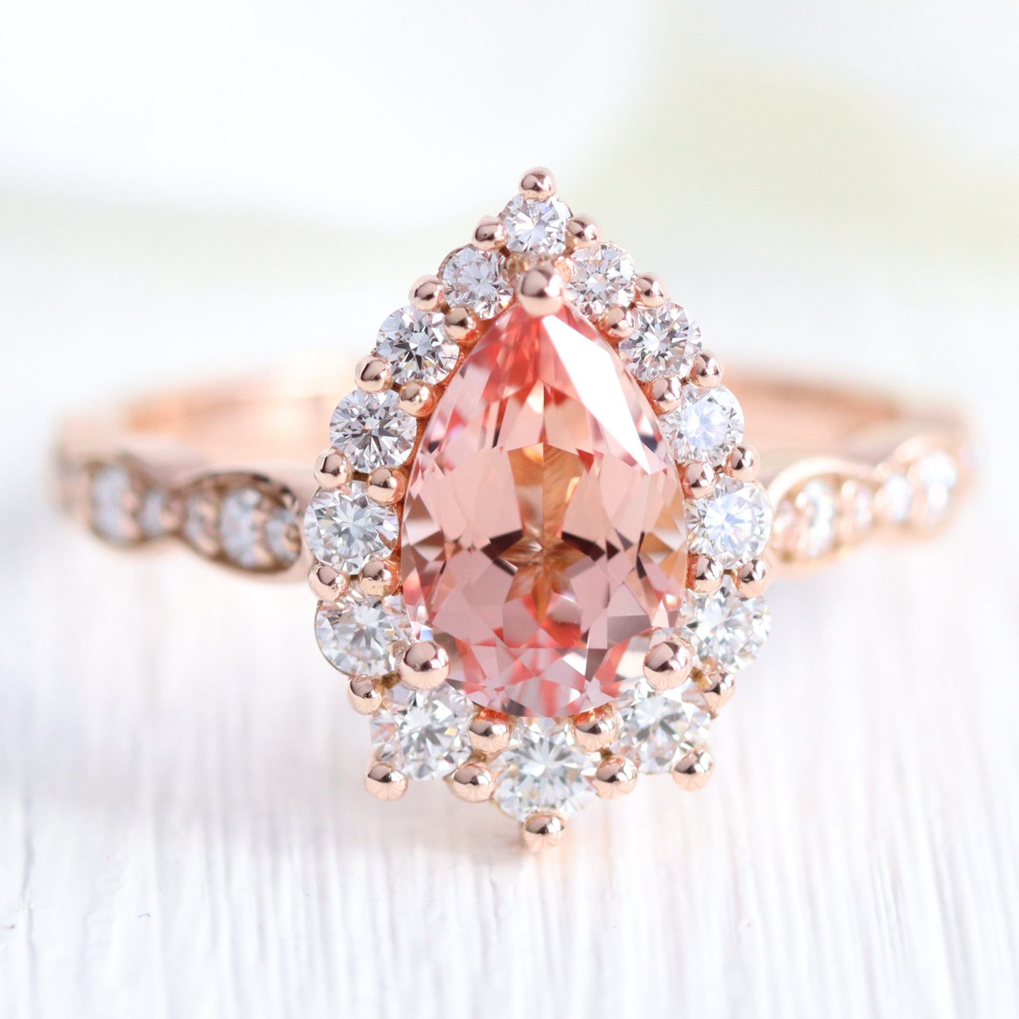 Large pear pink sapphire ring rose gold halo diamond peach sapphire engagement ring la more design jewelry