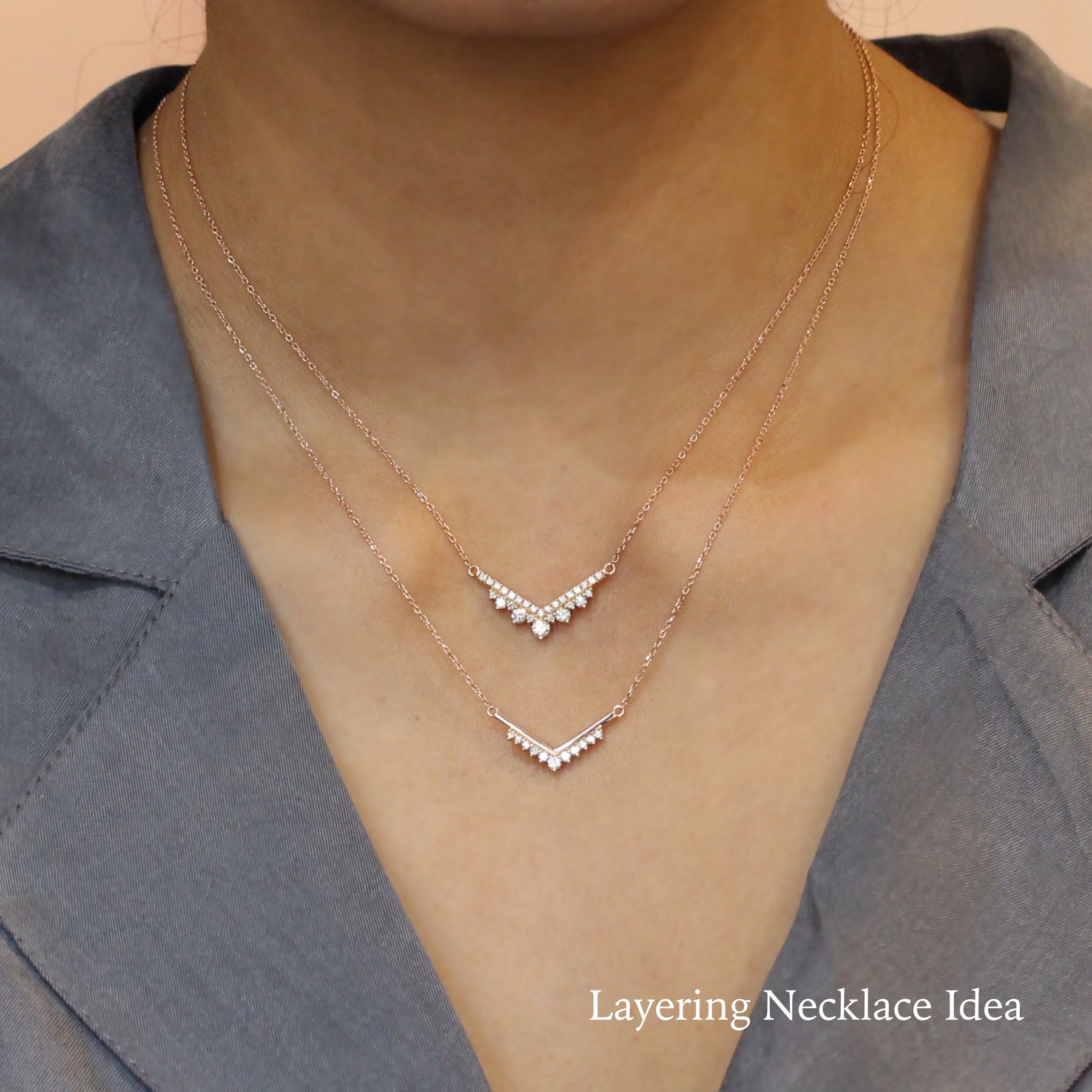 Three necklaces perfectly layered, and a ginormous oval shape