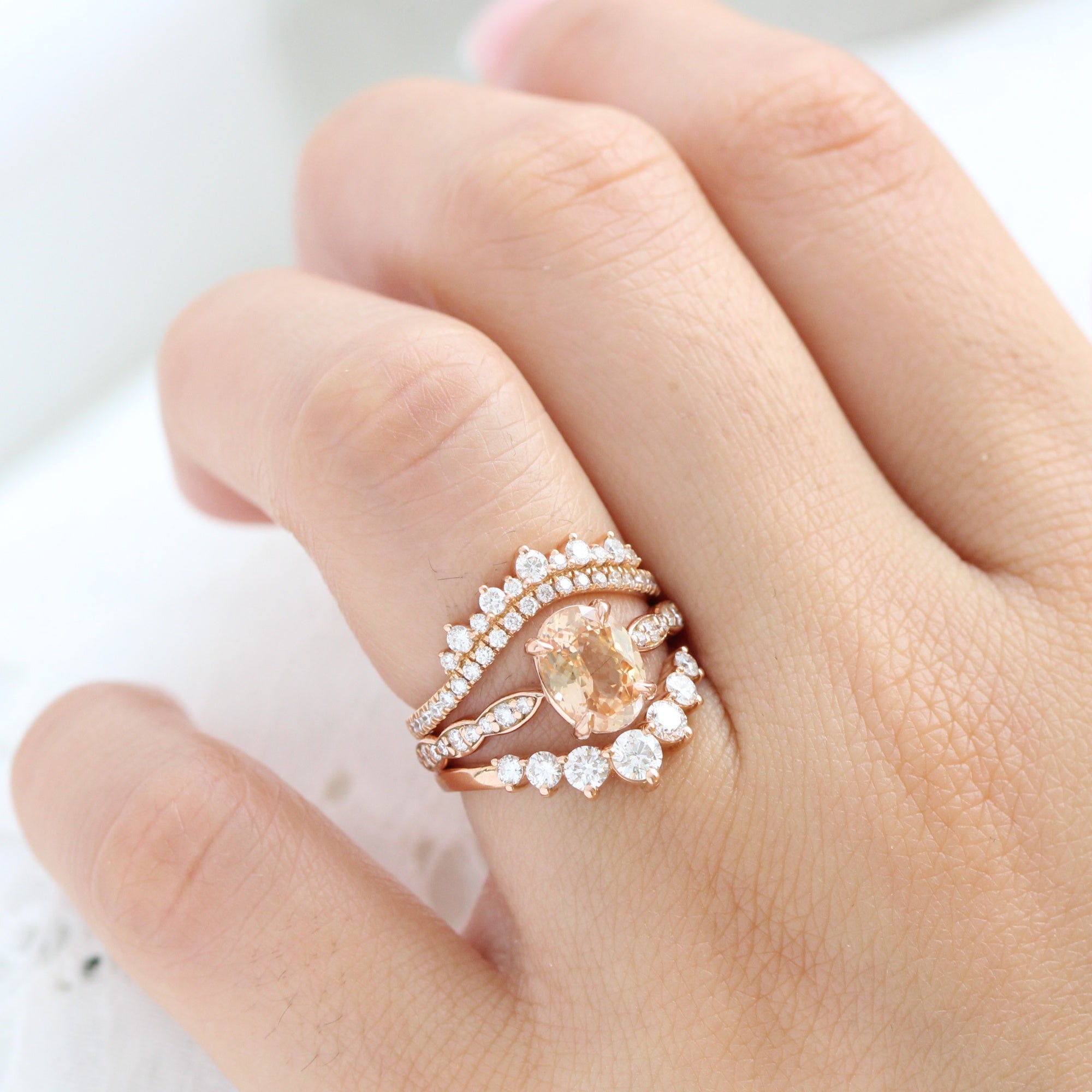 Oval peach sapphire ring rose gold diamond band low set engagement ring la more design jewelry