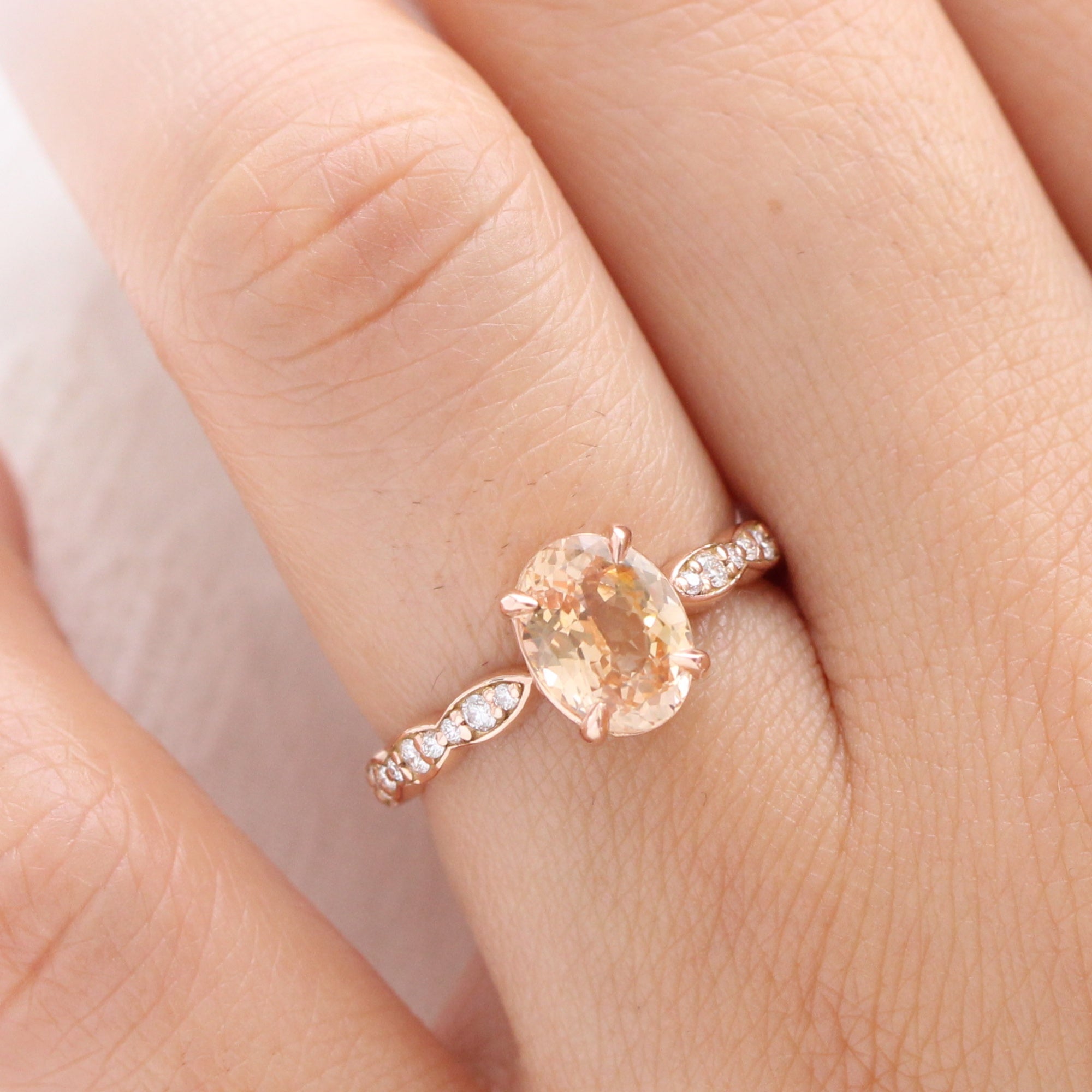 Oval peach sapphire ring rose gold diamond band low set engagement ring la more design jewelry