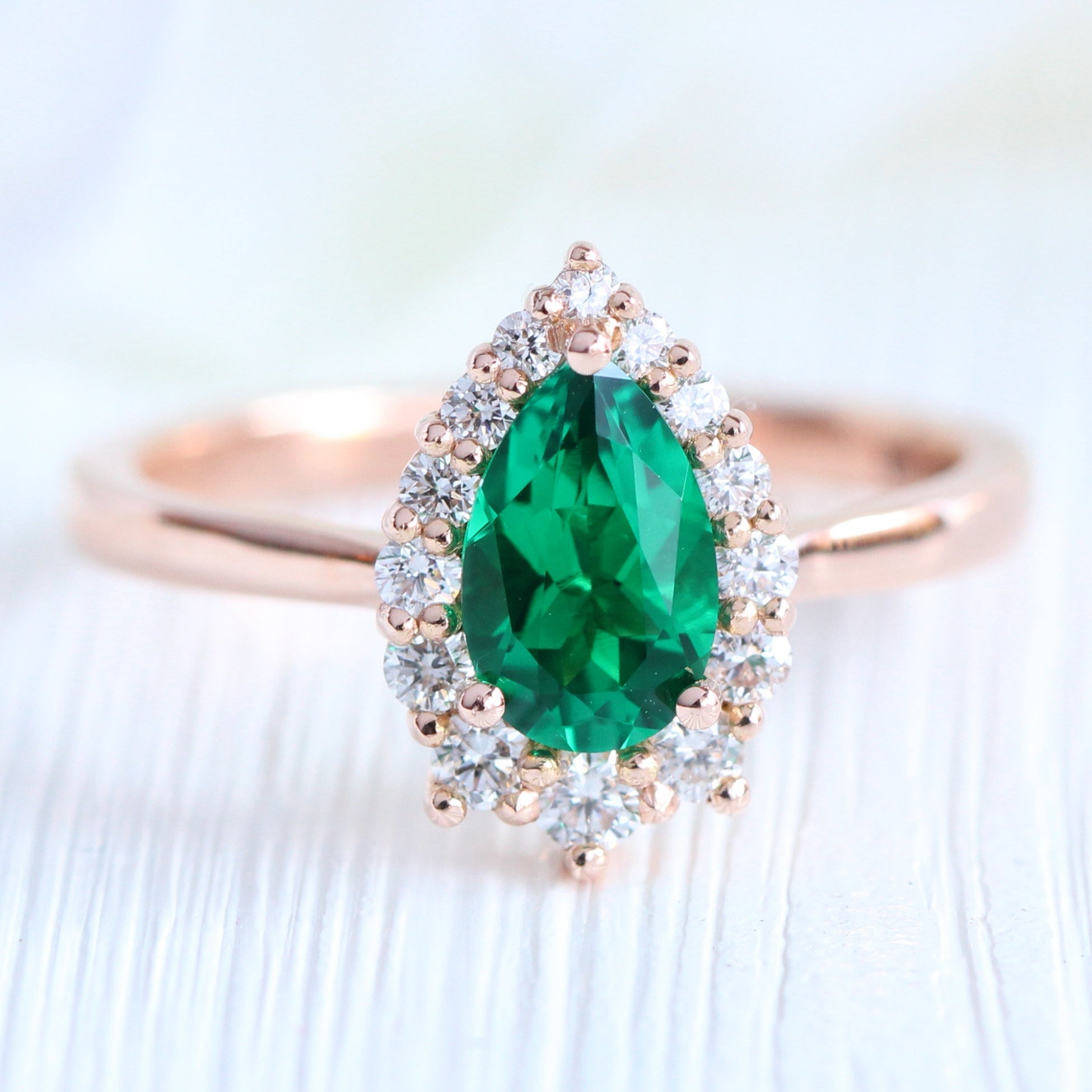 Pear emerald ring rose gold halo diamond ring la more design jewelry