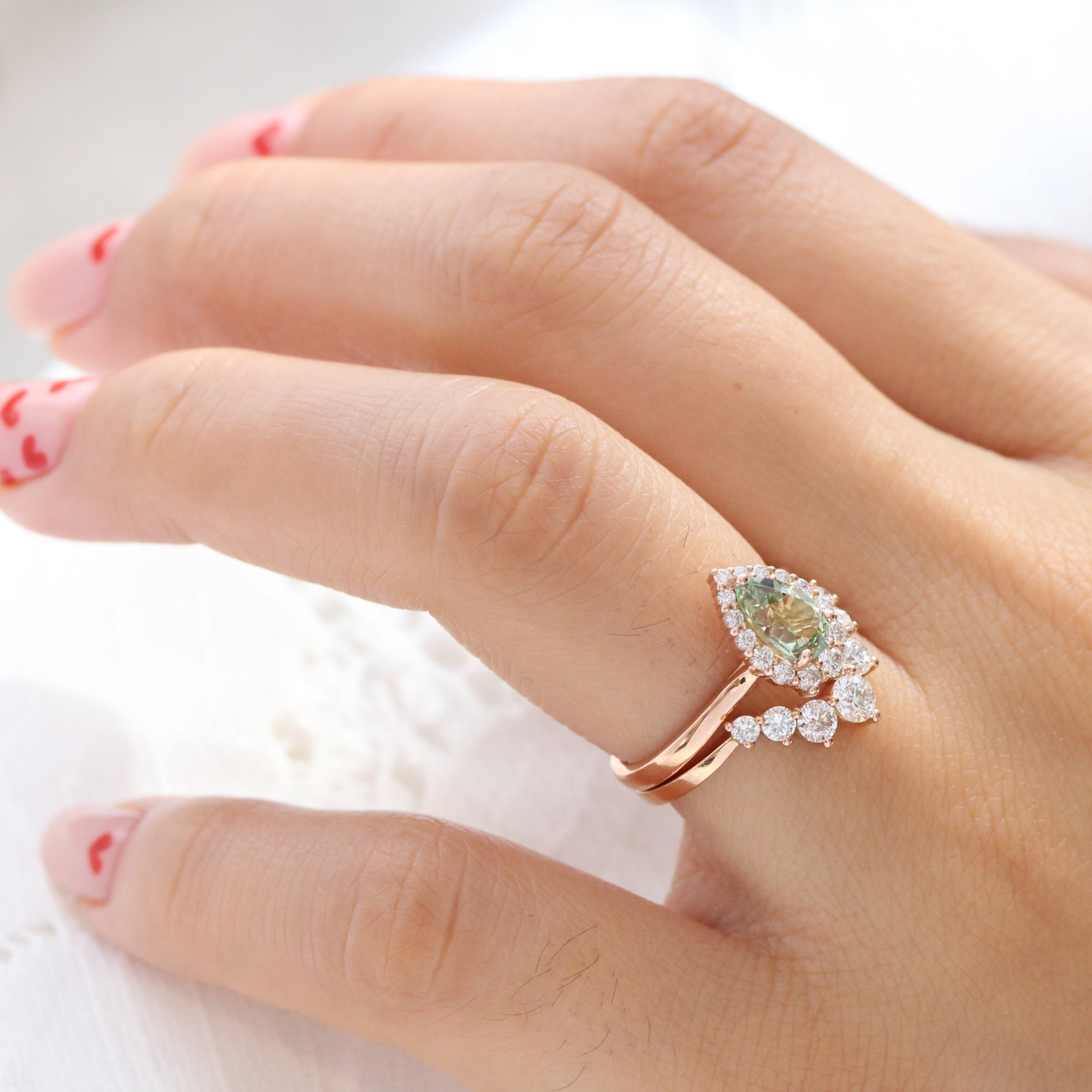 Pear green sapphire ring rose gold curved 7 diamond wedding band la more design jewelry