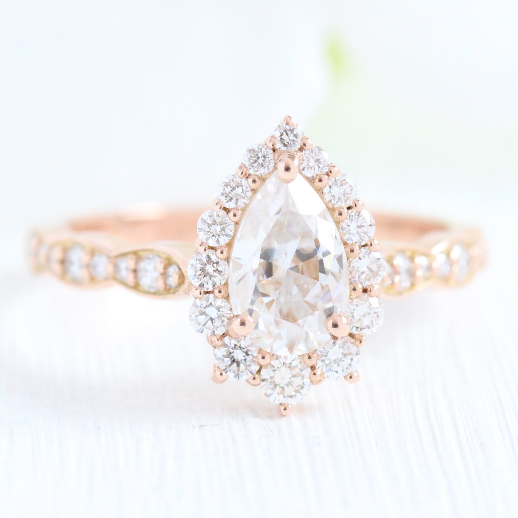 Pear moissanite engagement ring rose gold halo diamond ring la more design jewelry