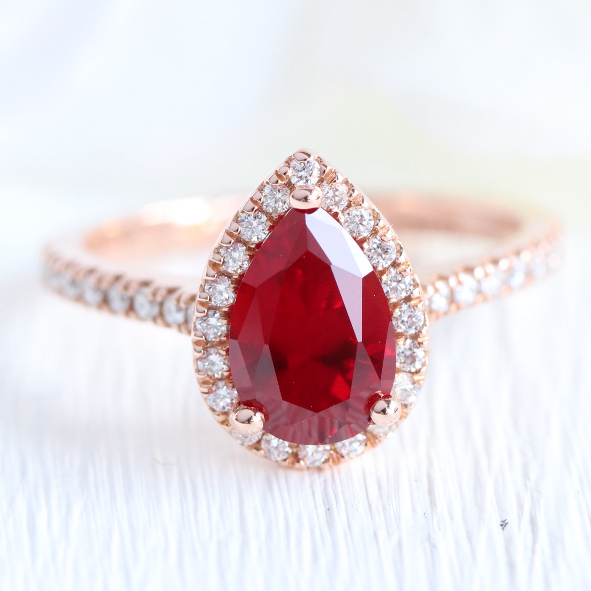 Pear ruby engagement ring rose gold halo diamond ruby ring la more design jewelry