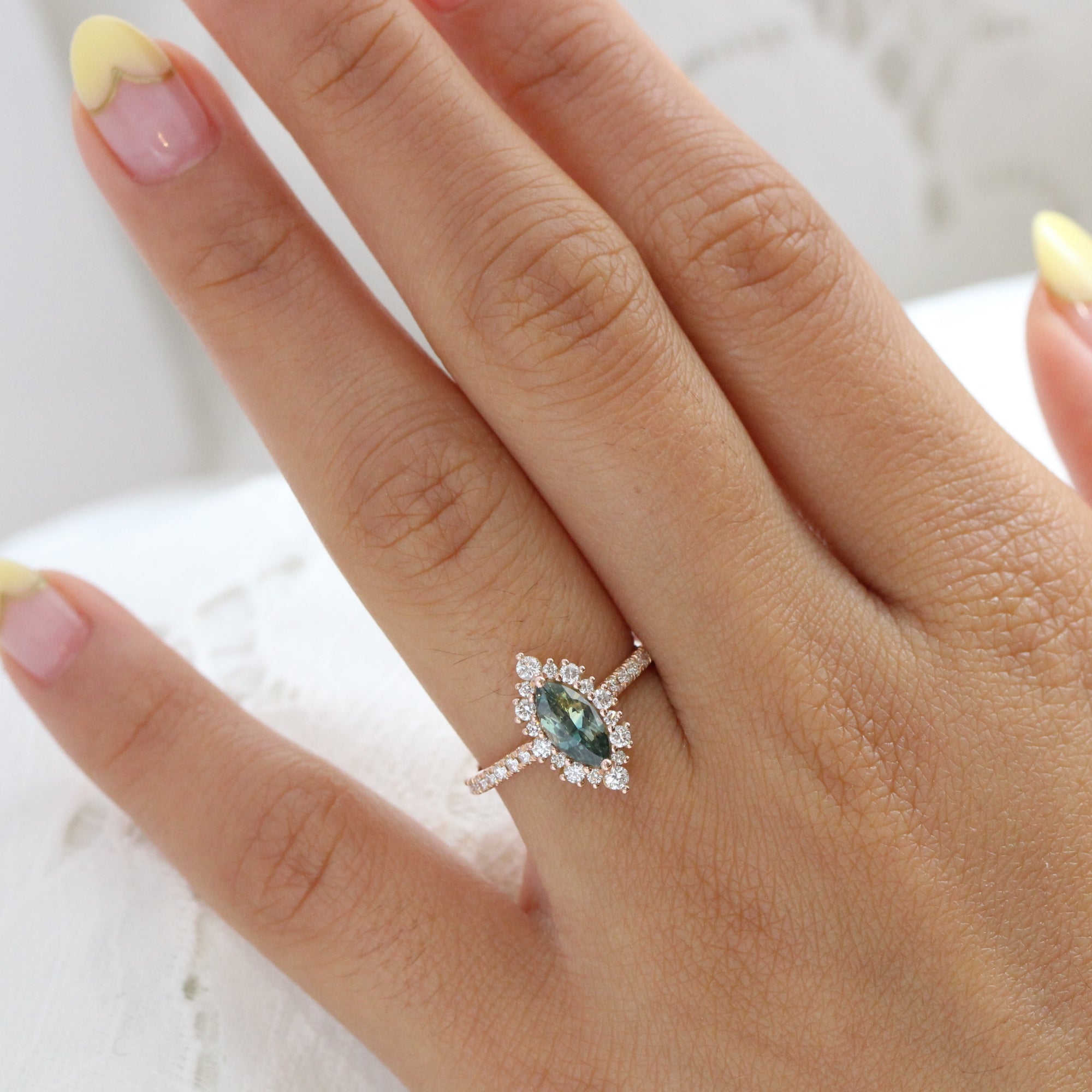 Teal green sapphire ring rose gold halo diamond marquise engagement ring la more design jewelry