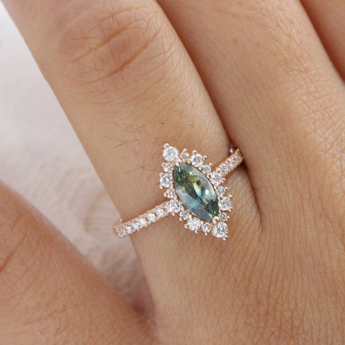 Teal green sapphire ring rose gold halo diamond marquise engagement ring la more design jewelry