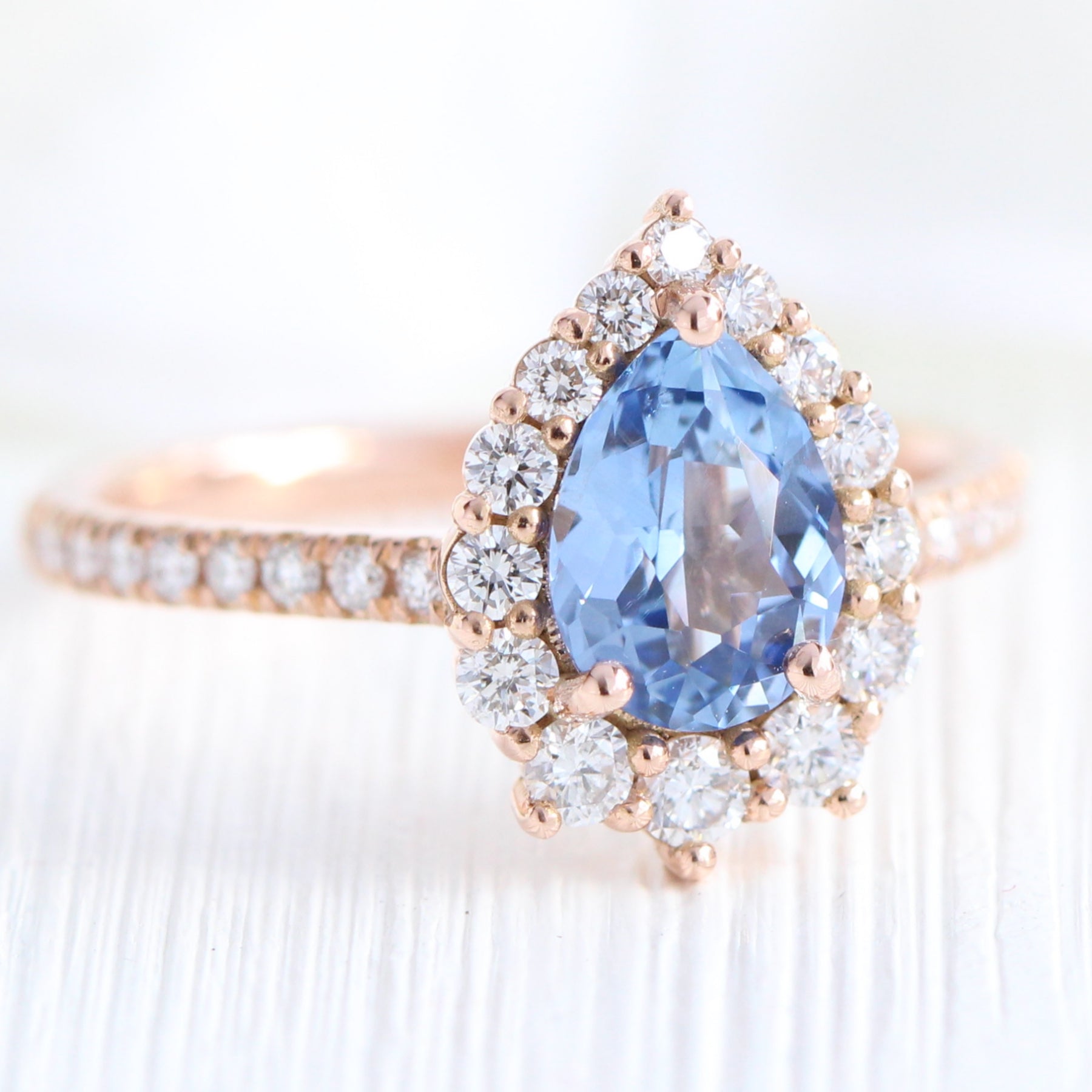 aqua blue sapphire ring rose gold halo diamond pear engagement ring la more design jewelry